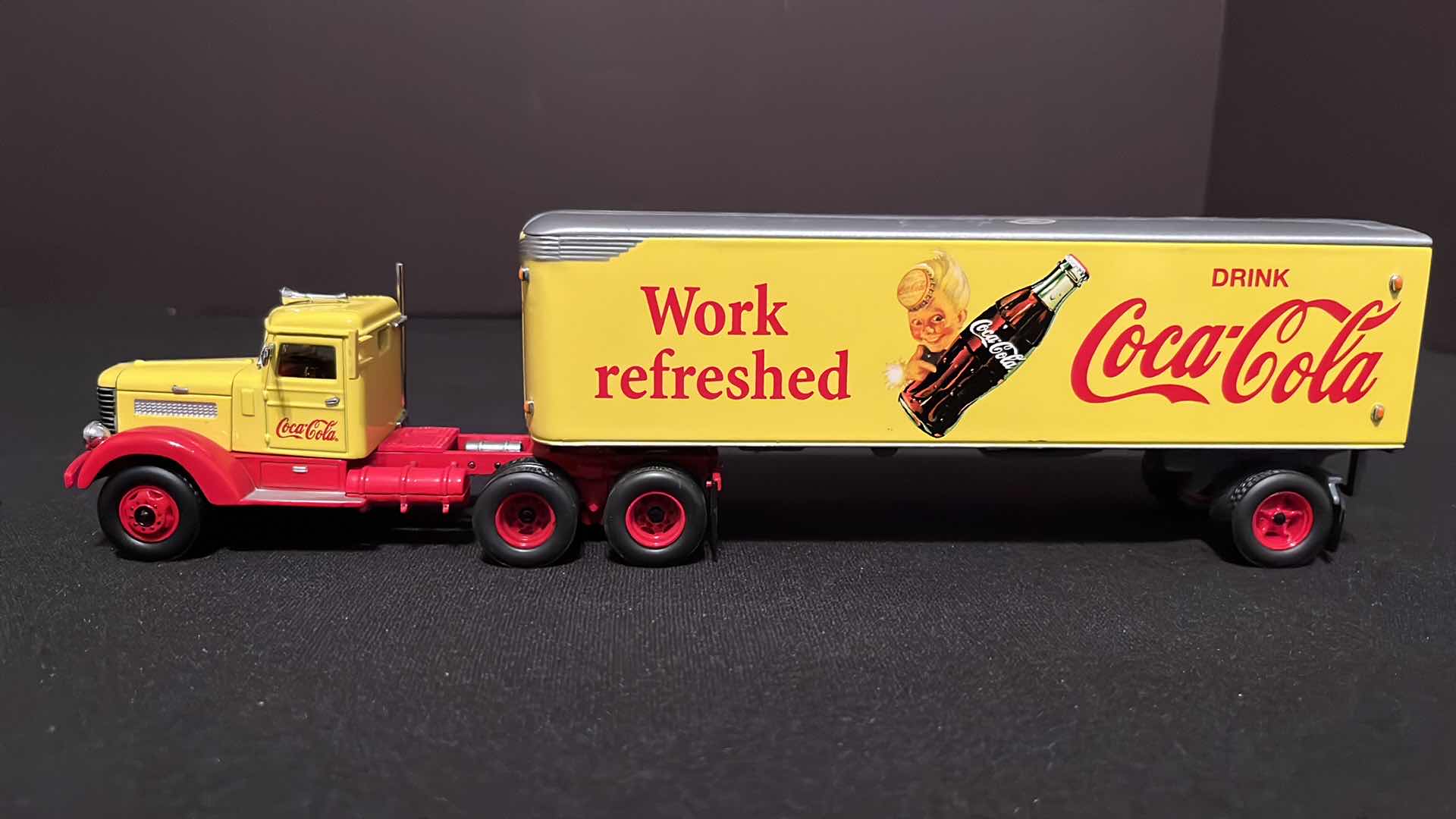 Photo 1 of COCA-COLA MATCHBOX COLLECTIBLES DINKY 1939 PETERBILT TRACTOR TRAILER, W COA, 1995 (MODEL DYM38050)