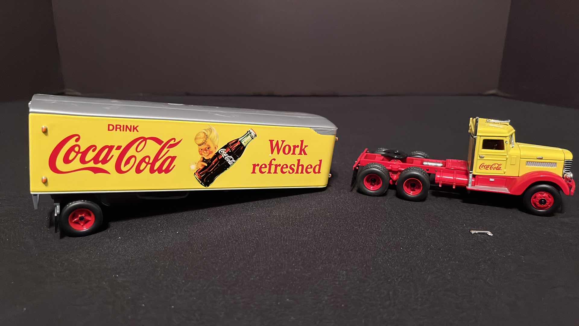 Photo 1 of COCA-COLA MATCHBOX COLLECTIBLES DINKY 1939 PETERBILT TRACTOR TRAILER, W COA, 1995 (MODEL DYM38050)