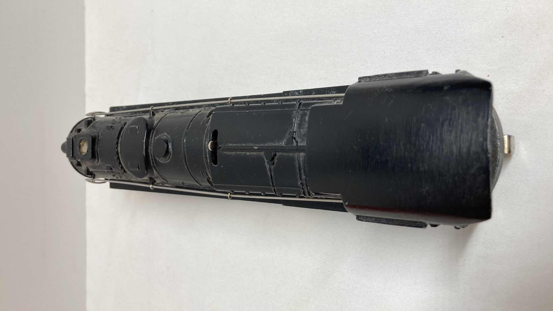 Photo 1 of LIONEL ELECTRIC TRAINS LOCOMOTIVE W SMOKE CHAMBER NO.671