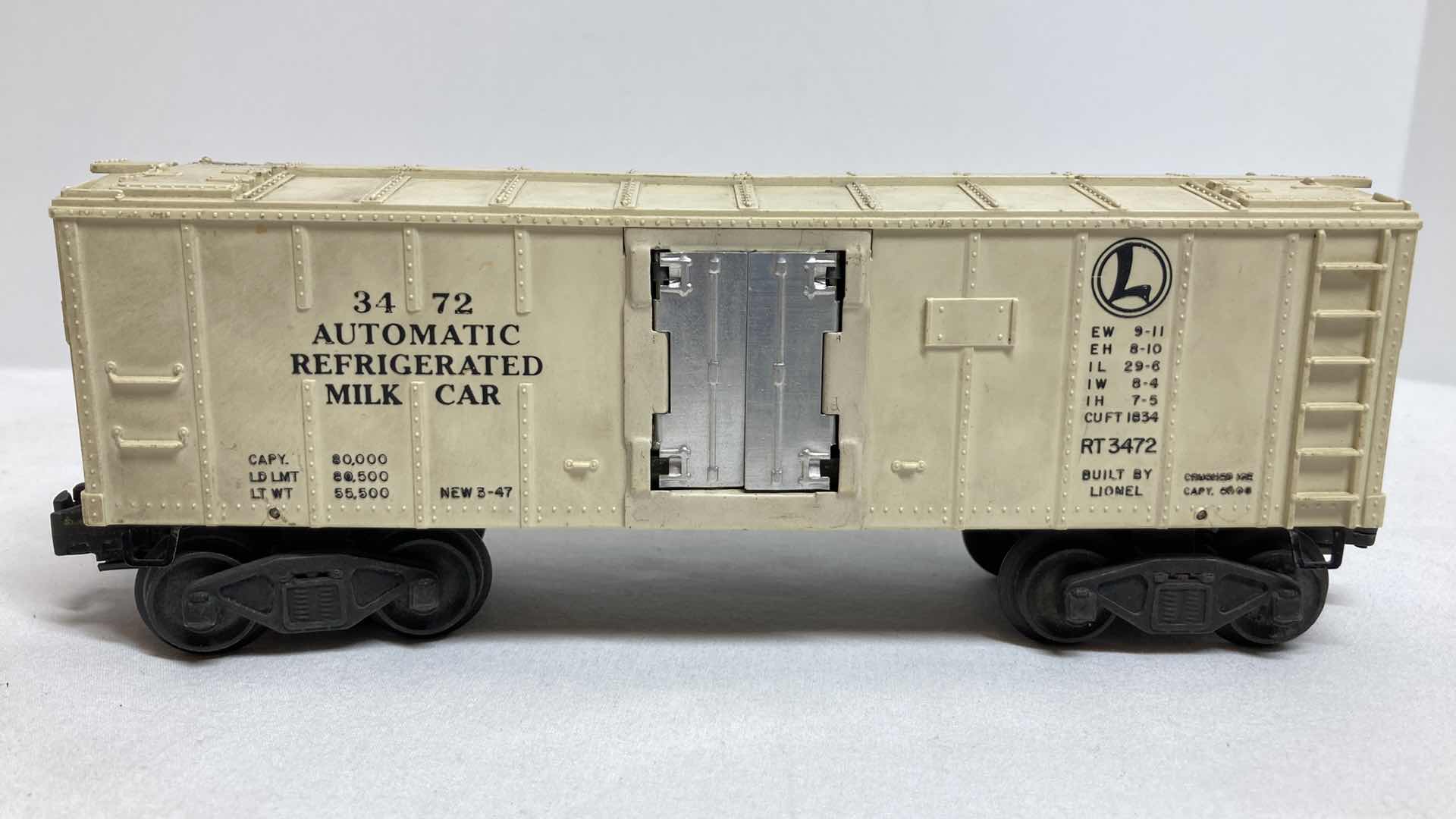 Photo 3 of LIONEL ELECTRIC TRAINS AUTOMATIC MILK CAR W UNLOADING PLATFORM NO.3472