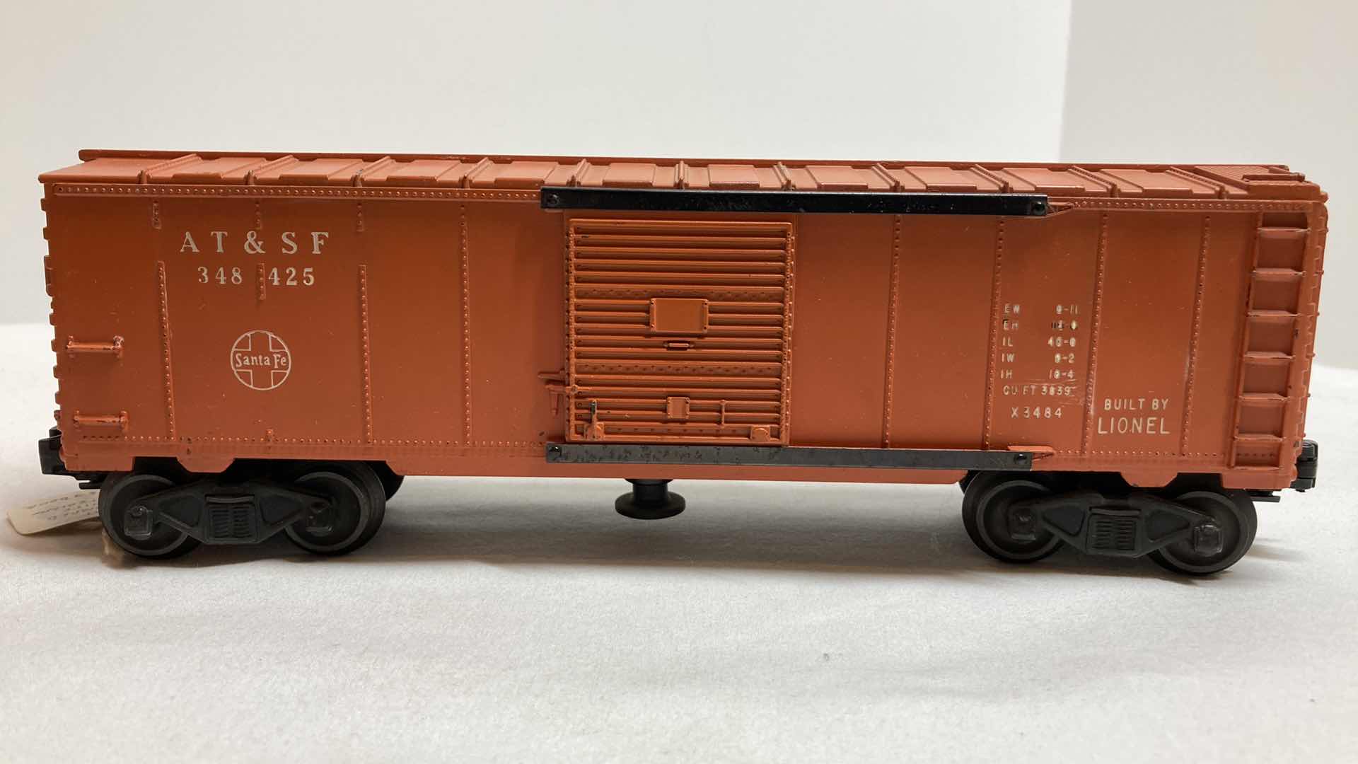 Photo 1 of LIONEL ELECTRIC TRAINS AT & SF BOX CAR 3484-25
