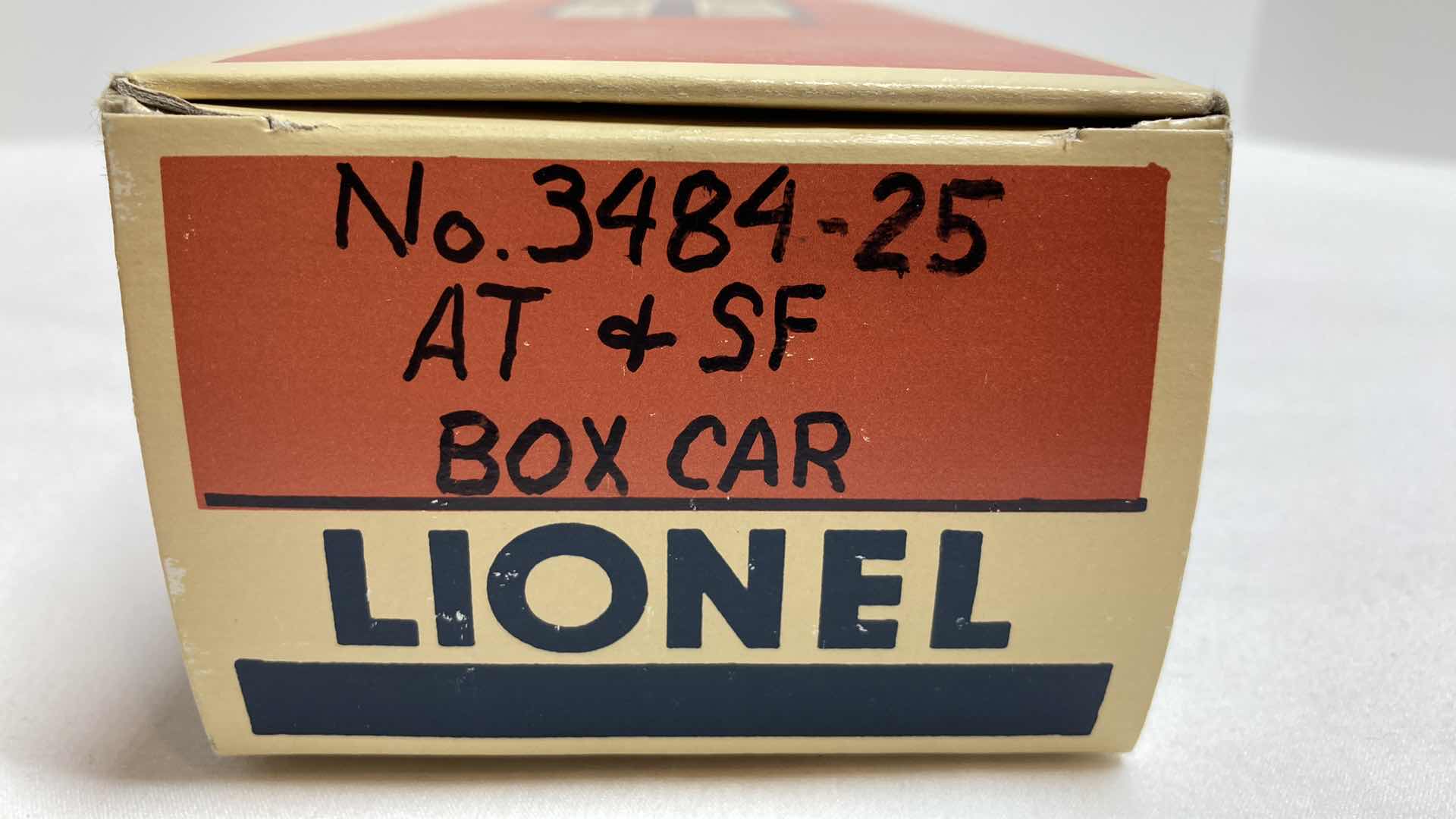 Photo 1 of LIONEL ELECTRIC TRAINS AT & SF BOX CAR 3484-25