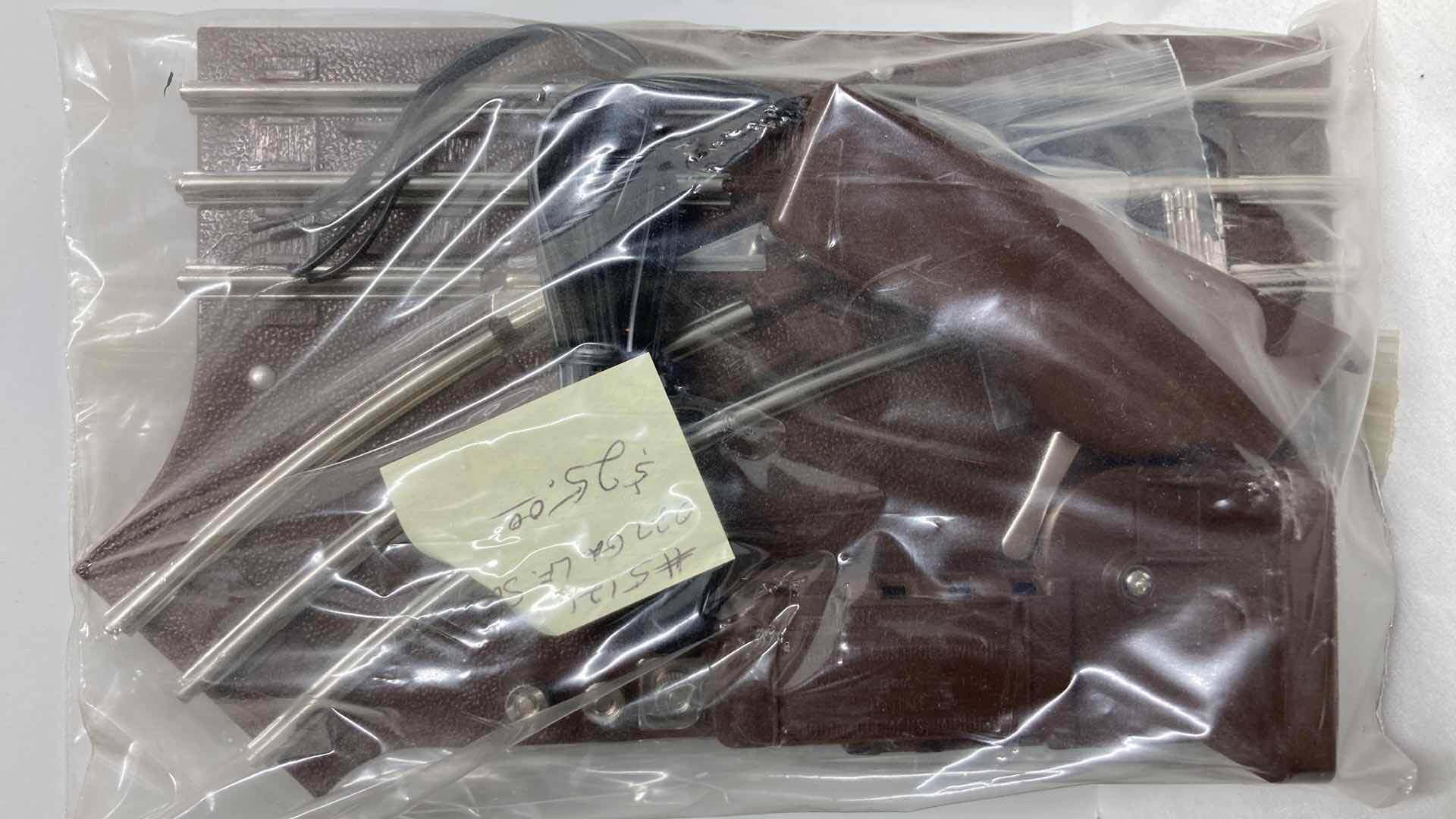 Photo 1 of LIONEL O27 GAUGE RIGHT HAND 6-5022 (1) & LEFT HAND 6-5021 (3) MANUAL CONTROL SWITCHES W REMOTE CONTROL SWITCH 6-5121