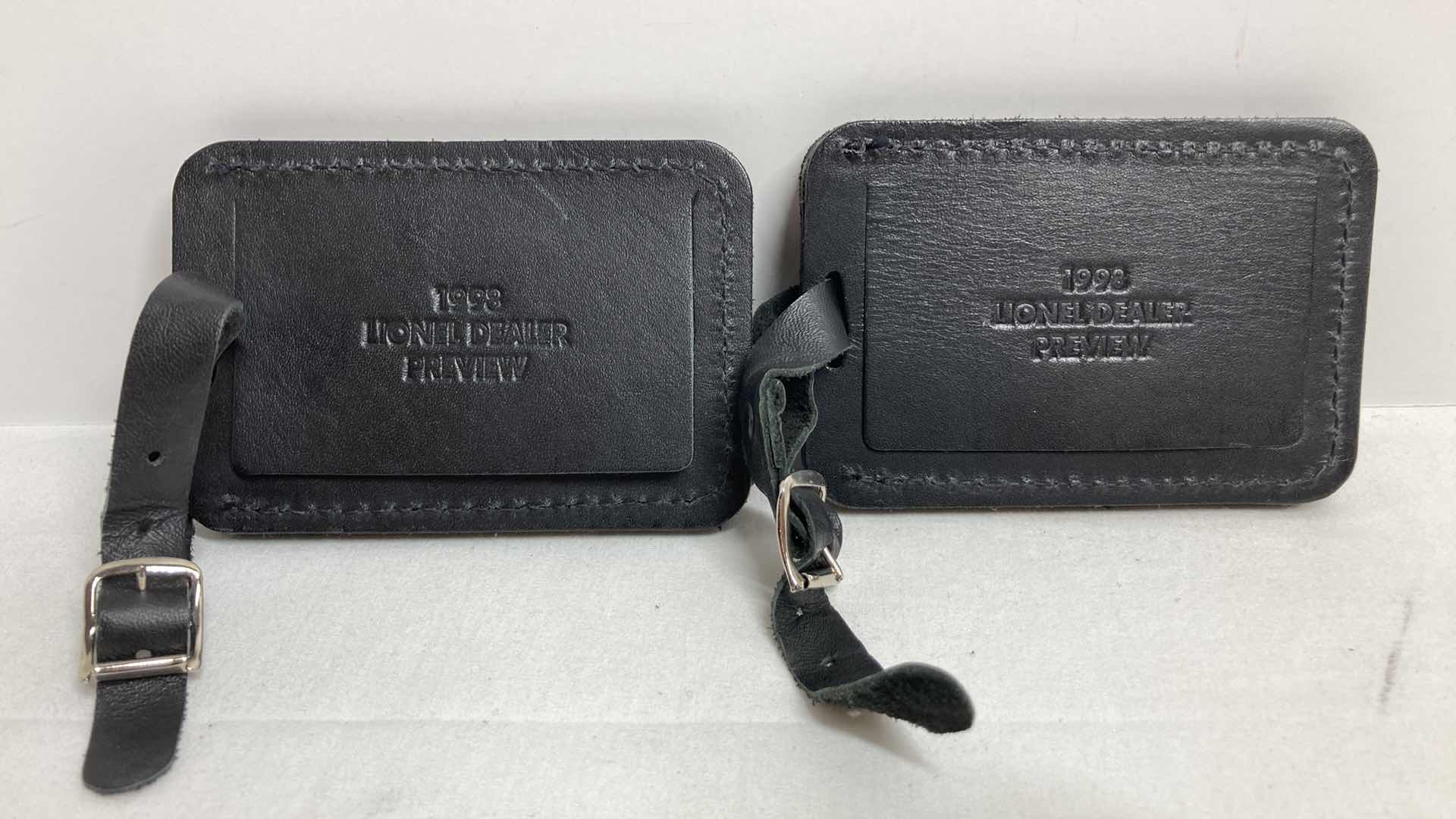 Photo 1 of LIONEL LEATHER KEYCHAIN (2) & LEATHER LUGGAGE TAGS (2)