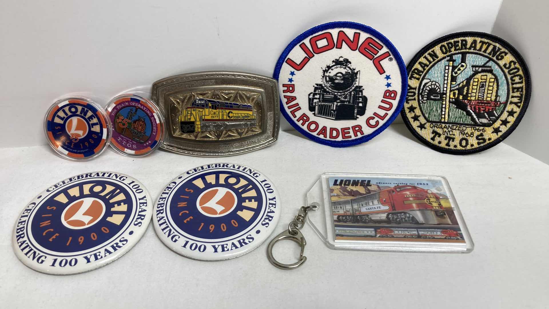 Photo 1 of LIONEL PRICE & RARITY GUIDE W TRAIN MEMORABILIA (8)