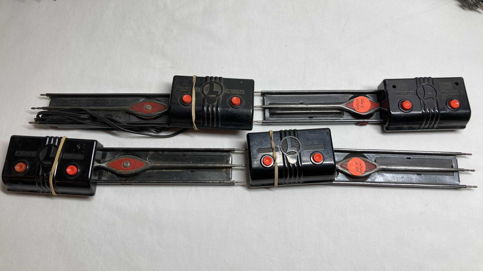 View 5 of LIONEL 12” O27 GAUGE STRAIGHT & CURVED TRACKS (APPROX 70) W REMOTE CONTROL TRACK SECTIONS (4)