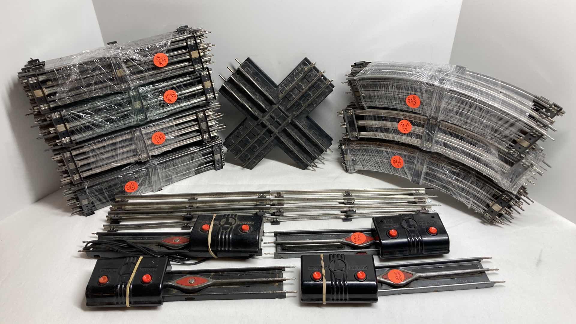 View 1 of LIONEL 12” O27 GAUGE STRAIGHT & CURVED TRACKS (APPROX 70) W REMOTE CONTROL TRACK SECTIONS (4)