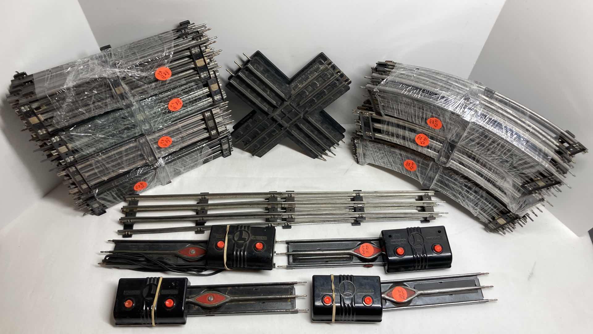 View 2 of LIONEL 12” O27 GAUGE STRAIGHT & CURVED TRACKS (APPROX 70) W REMOTE CONTROL TRACK SECTIONS (4)