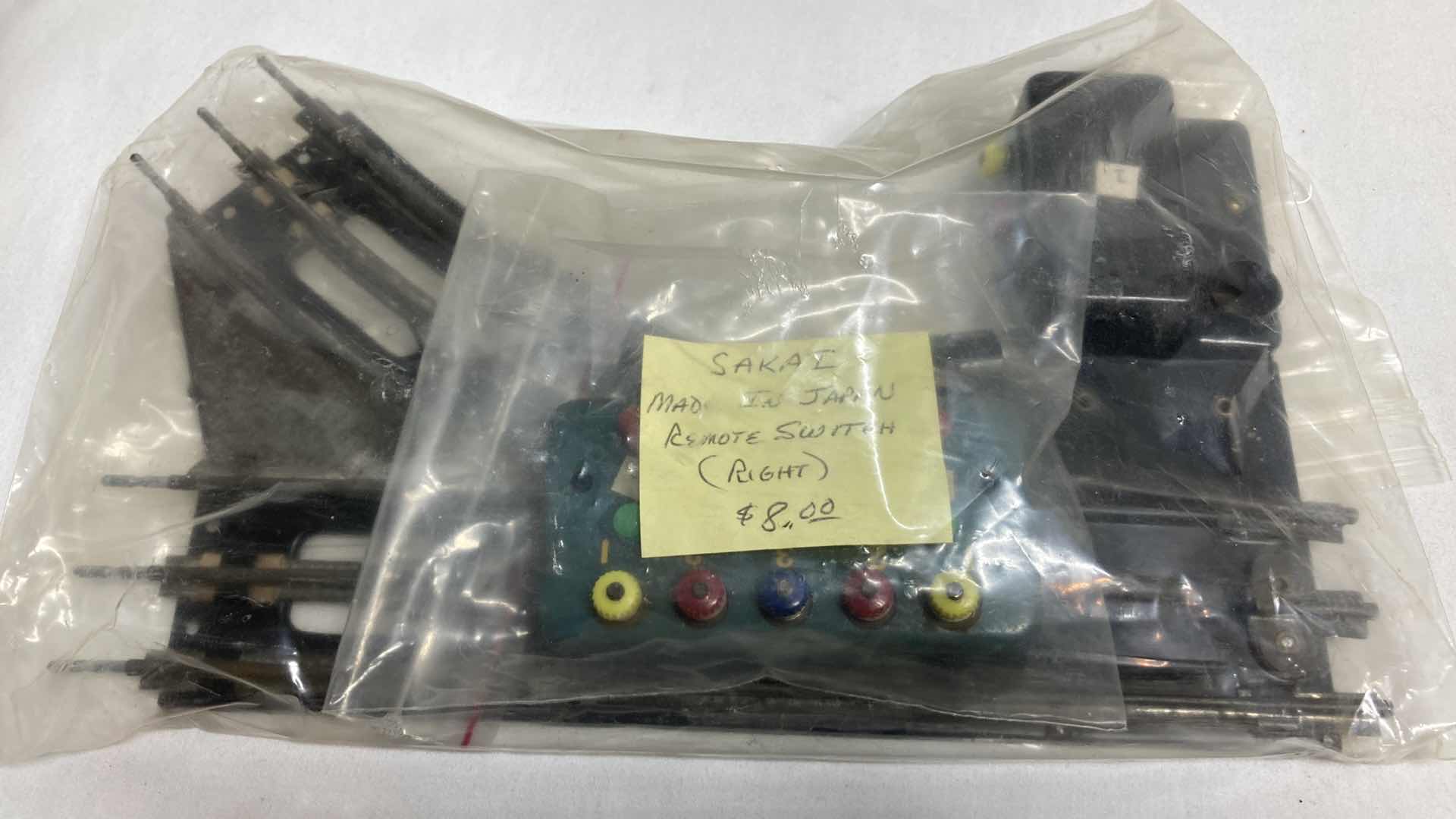 Photo 1 of LIONEL O27 GAUGE REMOTE W REMOTES, MANUAL SWITCHES (3) & SAKAI REMOTE SWITCHES JAPAN (2)