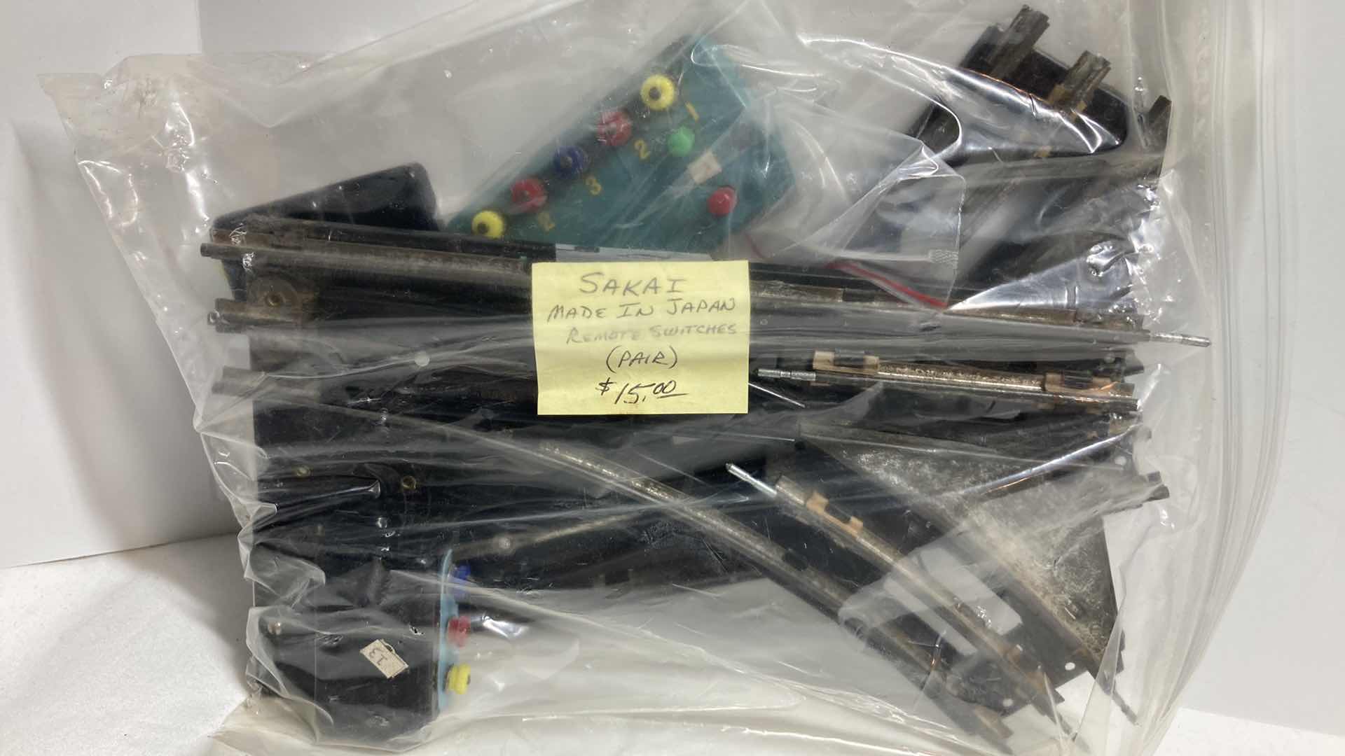 Photo 1 of LIONEL O27 GAUGE REMOTE W REMOTES, MANUAL SWITCHES (3) & SAKAI REMOTE SWITCHES JAPAN (2)