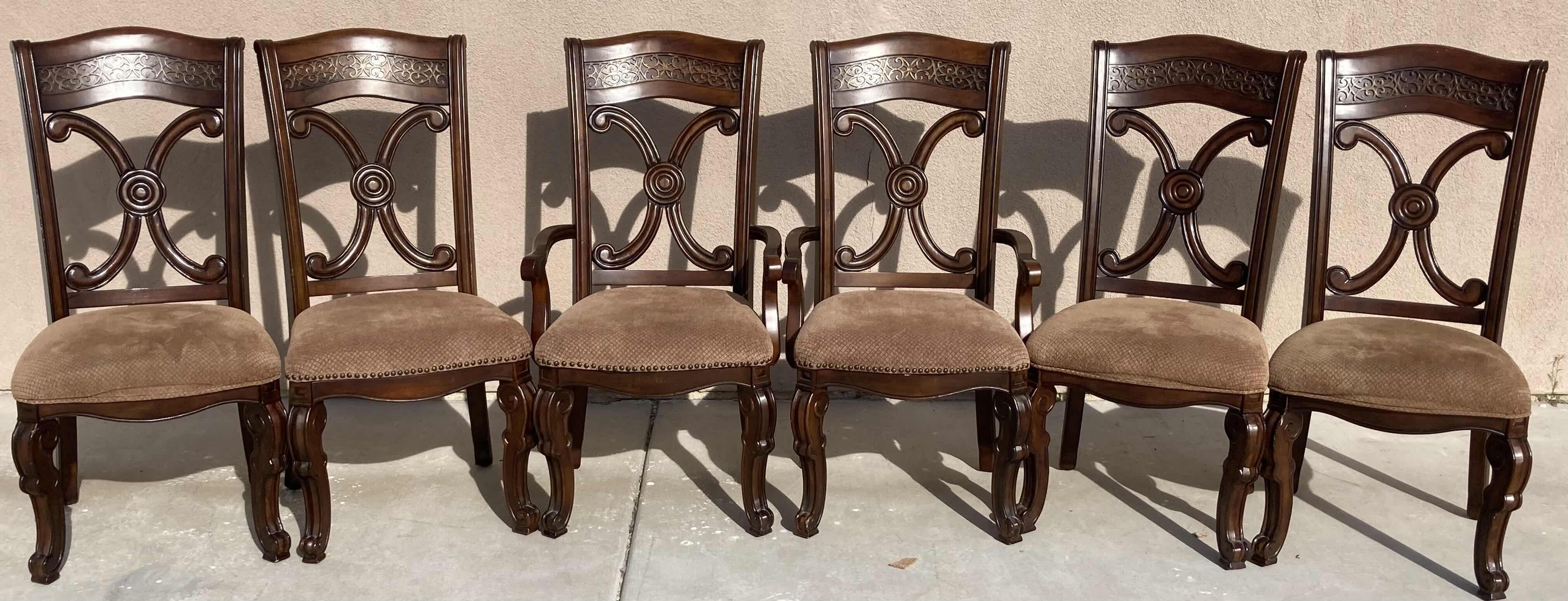 Photo 1 of PULASKI COSTA DORADA COLLECTION MAHOGANY FINISH DINING SET- VENEER TOP WOOD DINING TABLE-ARM CHAIRS (2) SIDE CHAIRS (4) 
(CHECK NOTES)