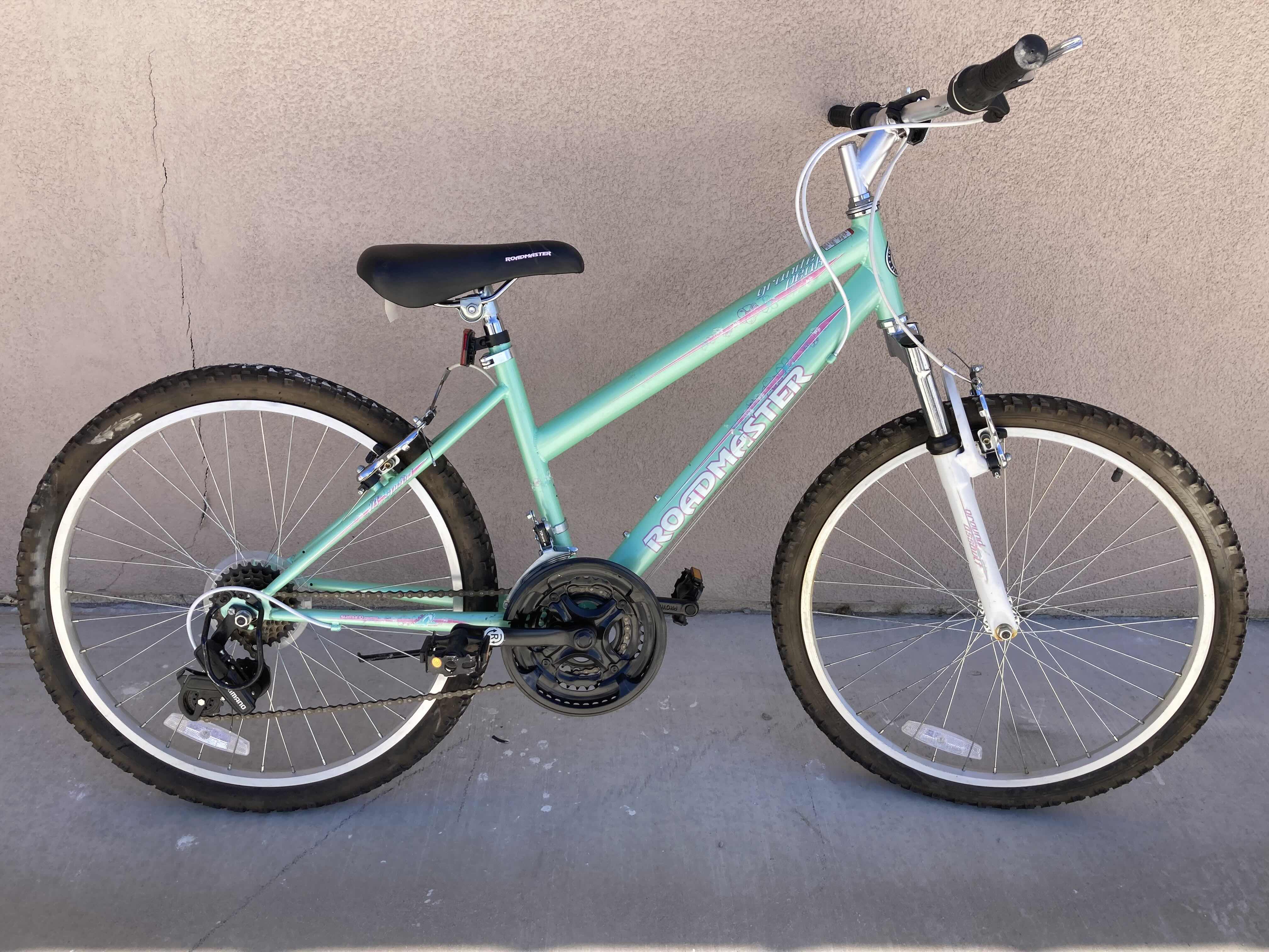 Photo 1 of ROADMASTER 24” GRANITE PEAK 18 SPEED SHIMANO EQUIPPED 
GRIP-SHIFT TRAIL BIKE (MODEL H3013WM)
