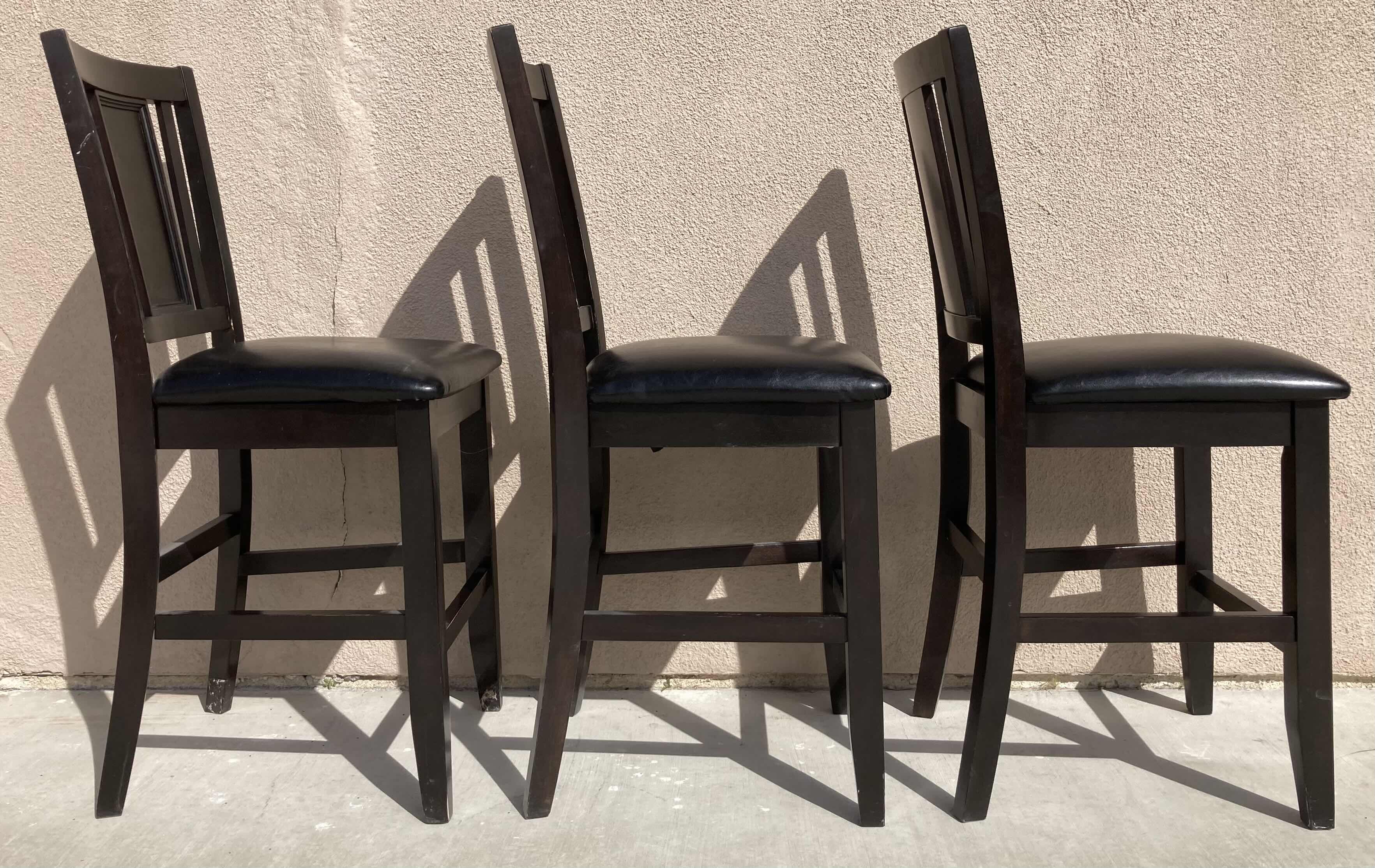 Photo 1 of ASHLEY FURNITURE CARLYLE COLLECTION BLACK WOOD FINISH BAR STOOLS SET OF 3 19” X 17” H40”