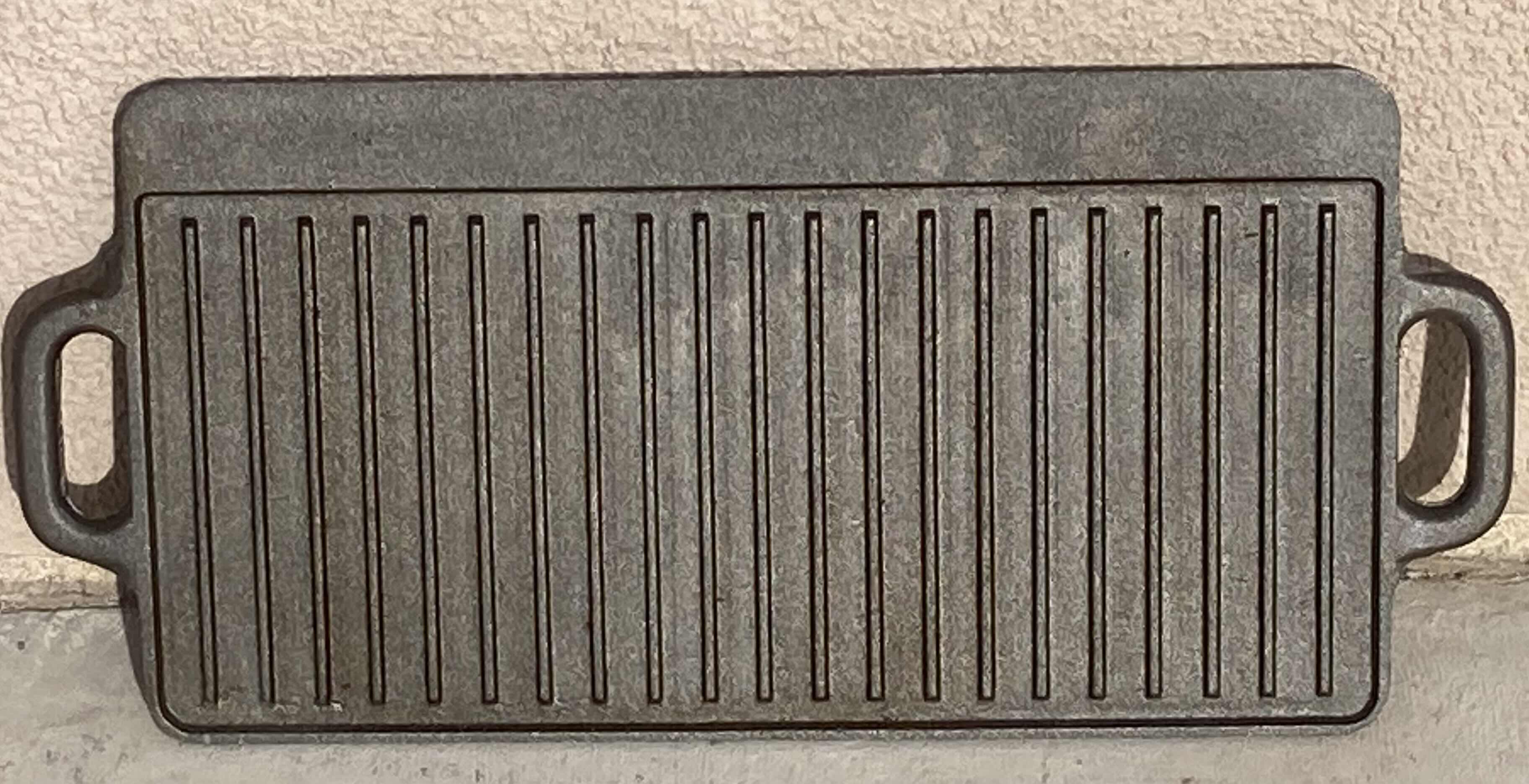 Photo 1 of CAST IRON GRILL GRIDDLE PLATE W CASE & GRABBER 20” X 9”