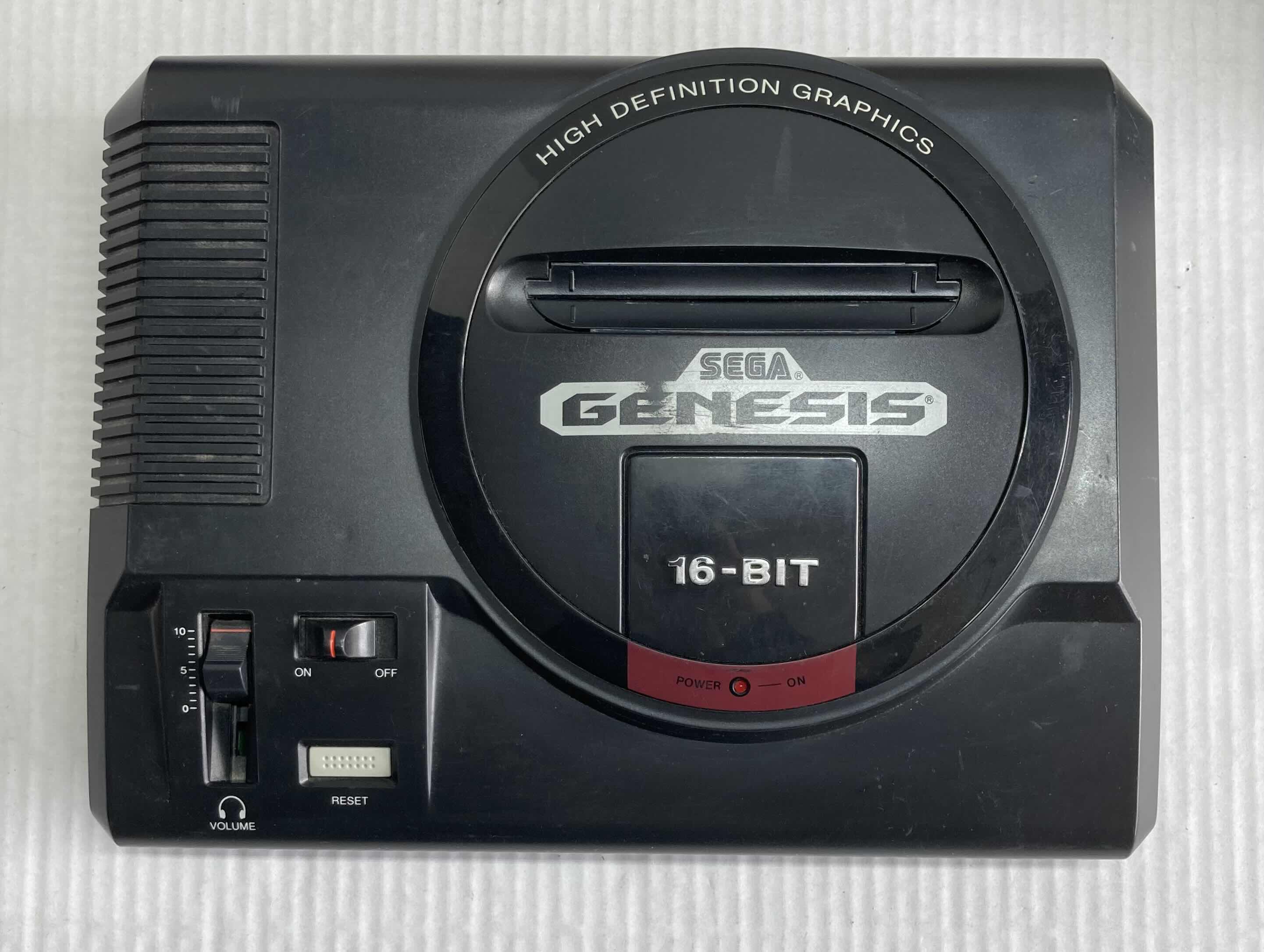 Photo 1 of SEGA GENESIS 16-BIT GAME SYSTEM W 3 CONTROLLERS, SONIC THE HEDGEHOG & NFL ‘95 VIDEO GAMES