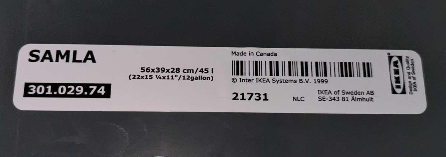 Photo 1 of HEFTY 40 QUART HI-RISE STORAGE BIN W LID & IKEA SAMLA 12 GAL CLEAR STORAGE BIN W LID