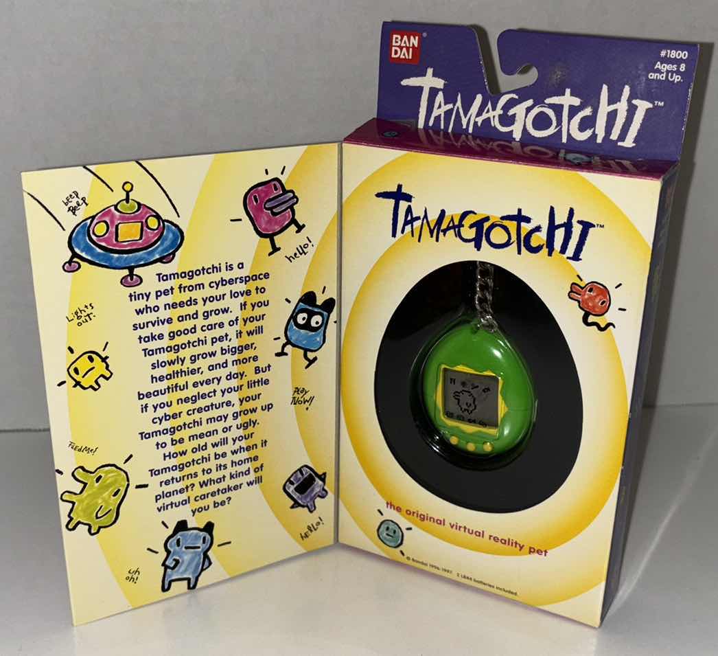 Photo 1 of NEW BANDAI 1996-97 TAMAGOTCHI, THE ORIGINAL VIRTUAL REALITY PET (TRANS GREEN) **NO RETURNS**