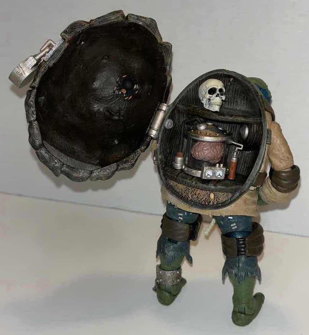 Photo 1 of NECA UNIVERSAL MONSTERS VS TMNT 7” ULTIMATE ACTION FIGURE “LEONARDO AS HUNCHBACK” **NO RETURNS**