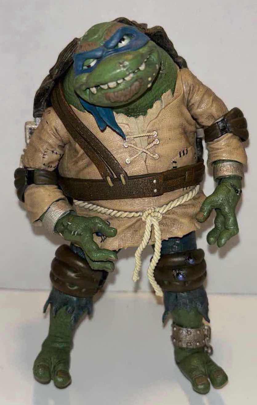 Photo 1 of NECA UNIVERSAL MONSTERS VS TMNT 7” ULTIMATE ACTION FIGURE “LEONARDO AS HUNCHBACK” **NO RETURNS**