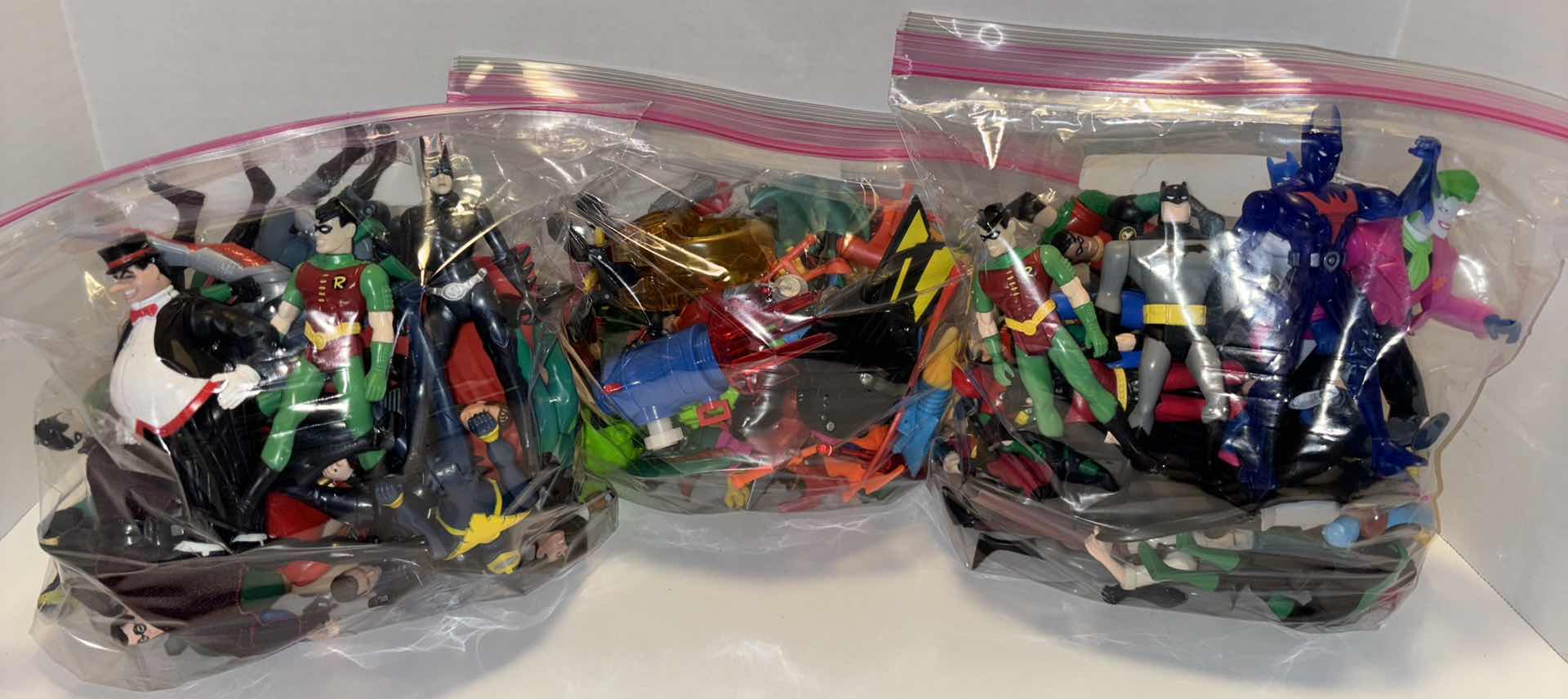 Photo 1 of DC BATMAN 57 VARIOUS ACTION FIGURES & BAG OF CAPES, WEAPONS & ACCESSORIES **NO RETURNS**