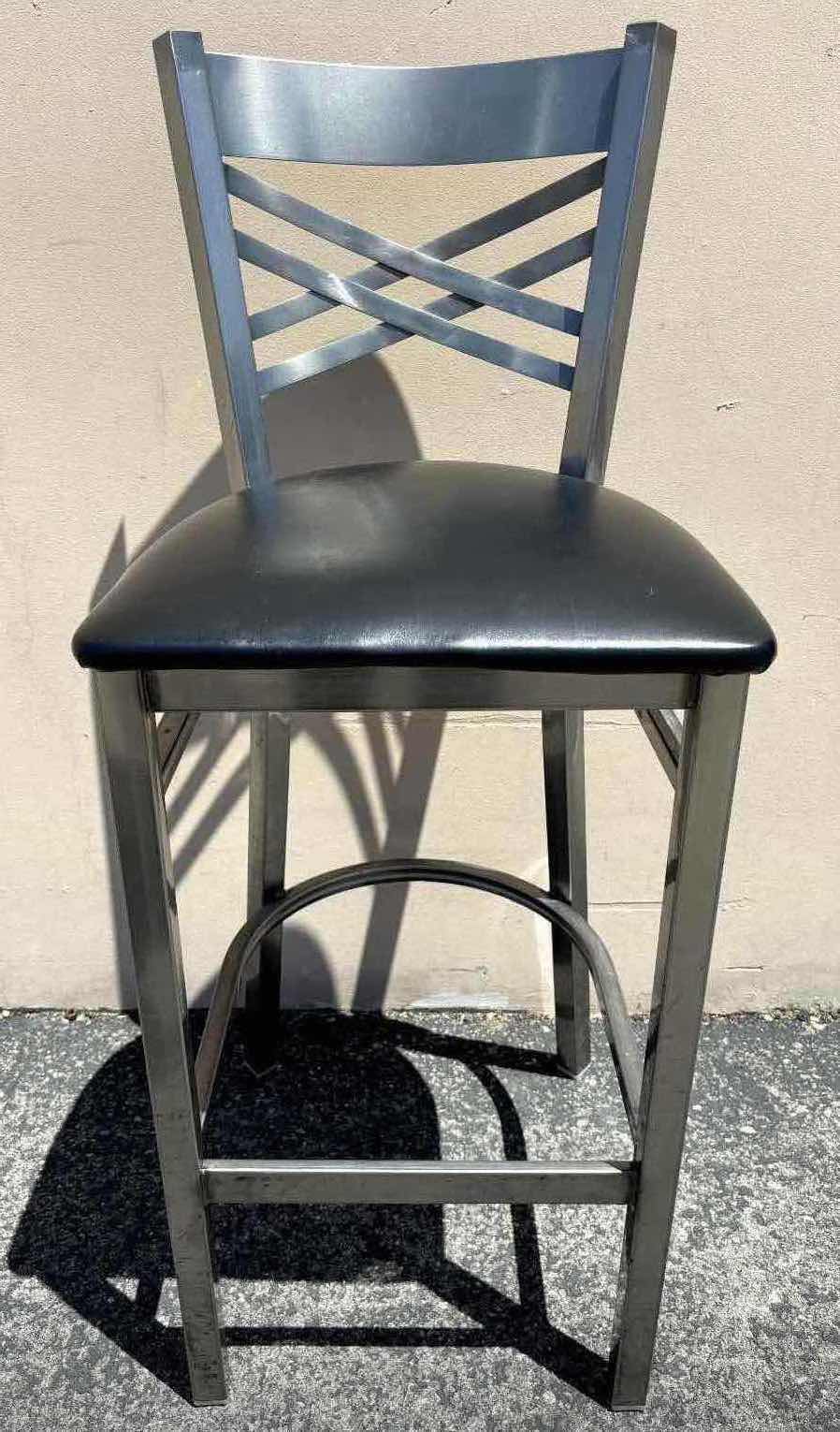 Photo 1 of FLASH FURNITURE HERCULES SERIES CLEAR COATED “X” BACK METAL RESTAURANT BARSTOOL W BLACK VINYL SEAT, 17” X 18” H42.25”(1)