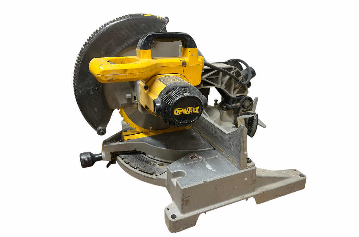 Photo 1 of DEWALT 12” COMPOUND MITTER SAW MODEL DW705