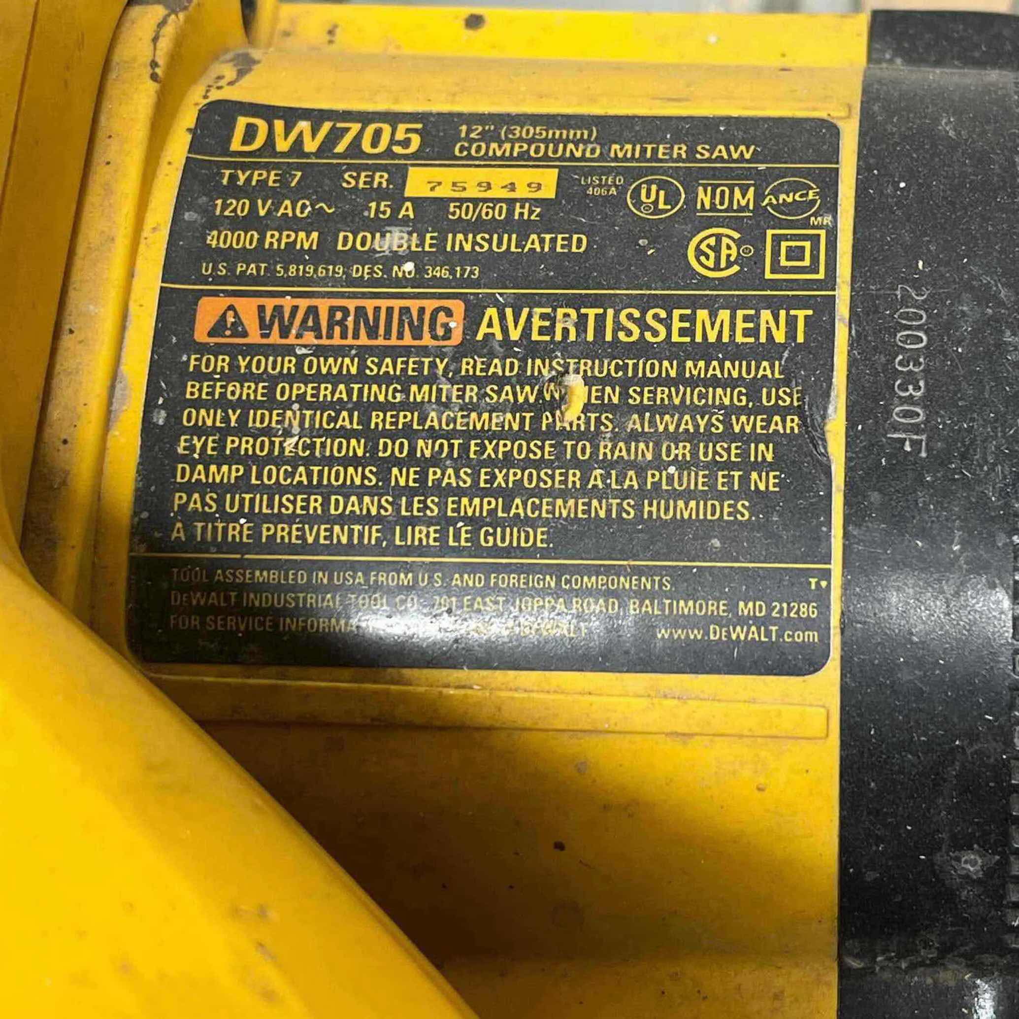 Photo 1 of DEWALT 12” COMPOUND MITTER SAW MODEL DW705