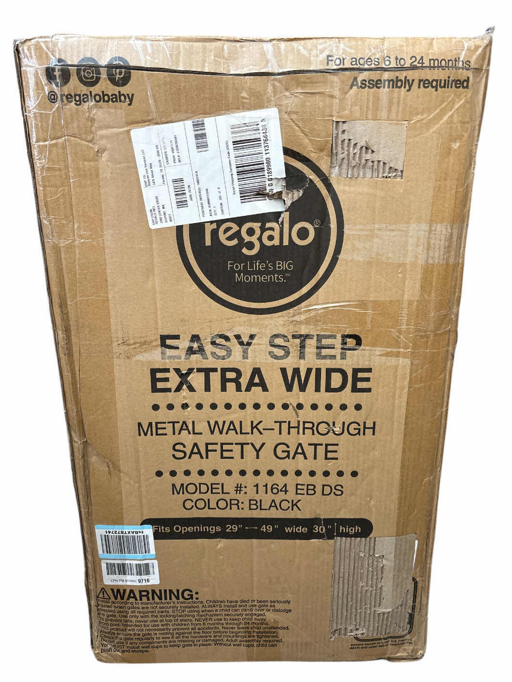 Photo 1 of NEW REGALO EASY STEP EXTRA WIDE METAL WALK-THROUGH SAFETY GATE, INCLUDES 4” & 12” EXTENSION KIT, 4 PACK OF PRESSURE MOUNT KIT & 4 PACK OF WALL MOUNT KIT, FITS OPENINGS 29”-49” WIDE, 30” HIGH (BLACK, MODEL #1164 EB DS)