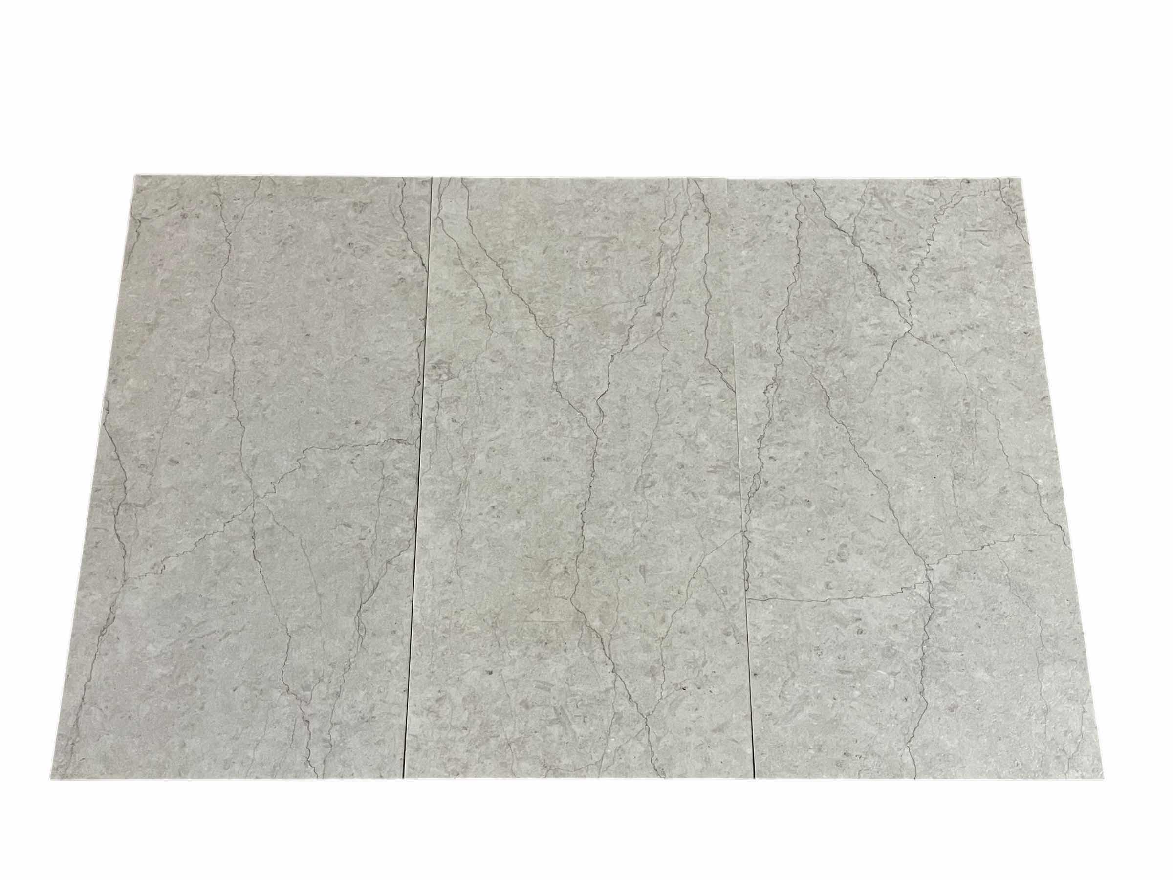 Photo 1 of LVP CRACKED GRAY MARBLE FINISH GLUE DOWN VINYL PLANKS 12” X 24” (28SQFT PER CASE/10CASES APPROX. 280SQFT TOTAL) READ NOTES