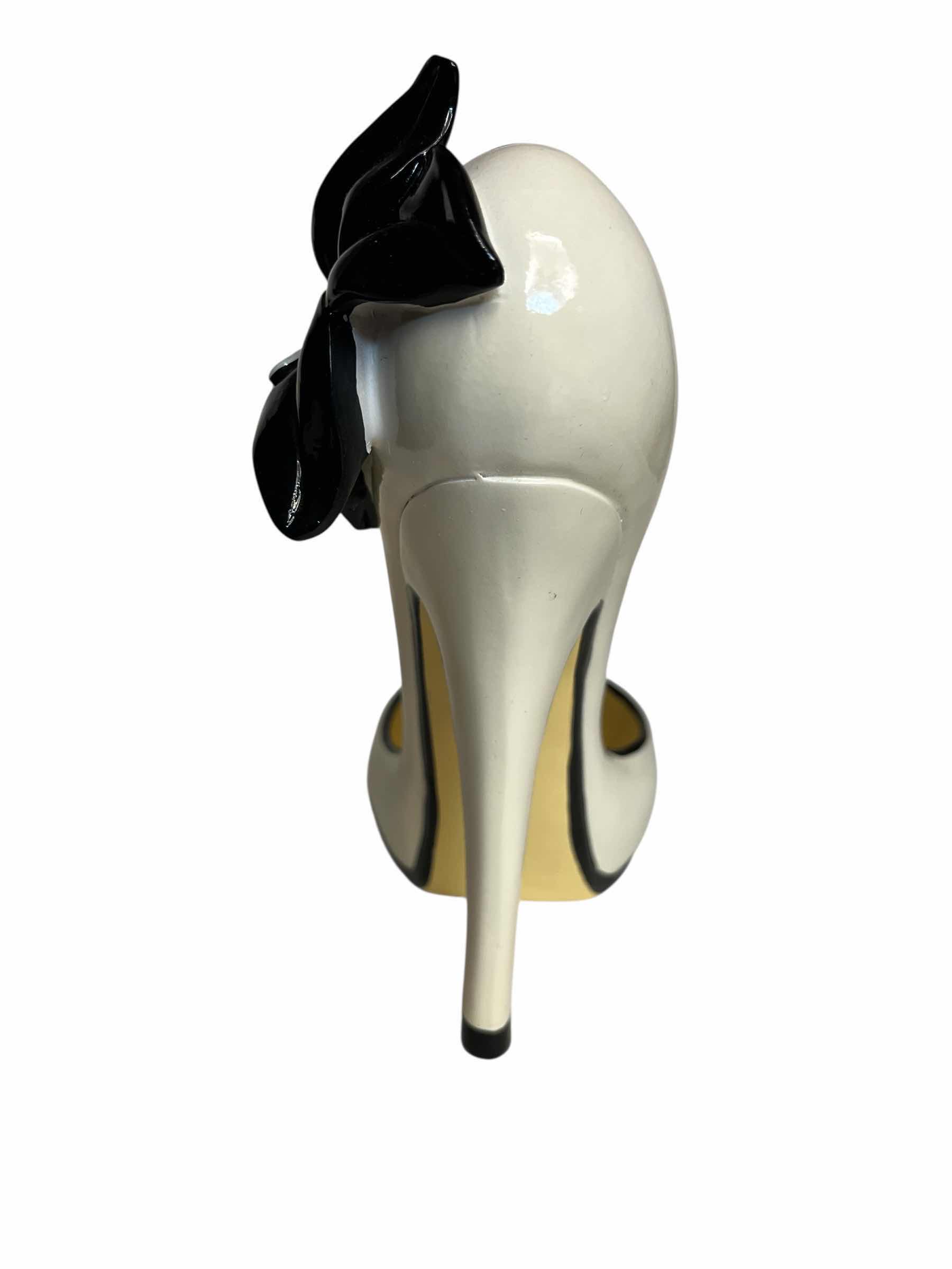 Photo 1 of HIGH HEEL CERAMIC WINE BOTTLE HOLDER 3.75” X 7” H8”
