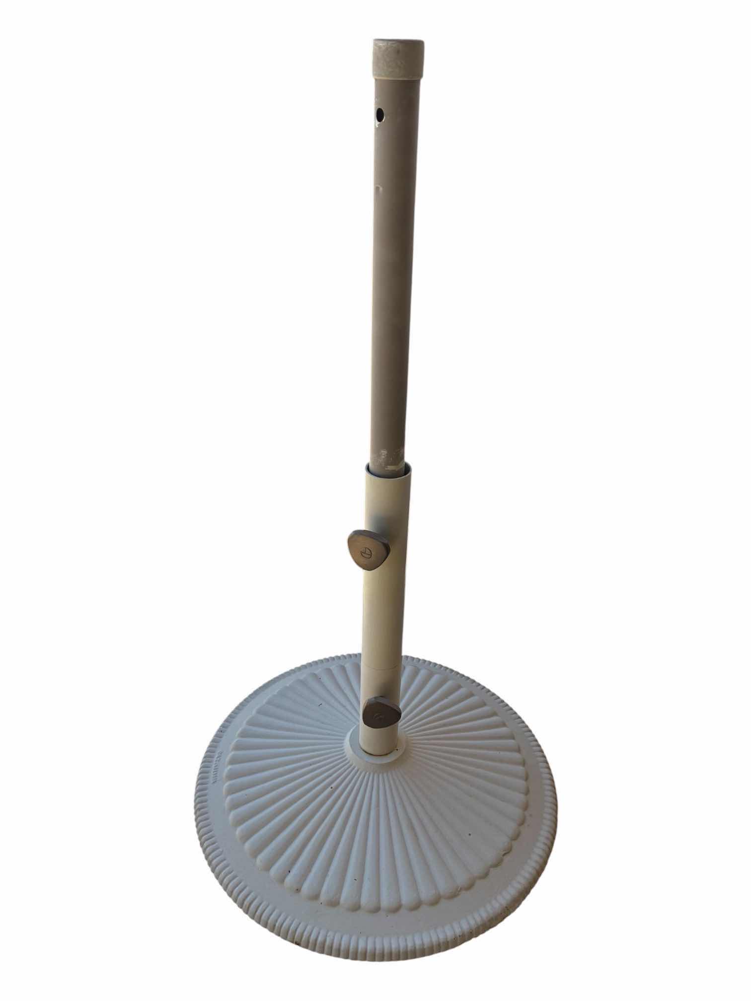 Photo 1 of CAST-IRON BASE UMBRELLA STAND 19” X 35”