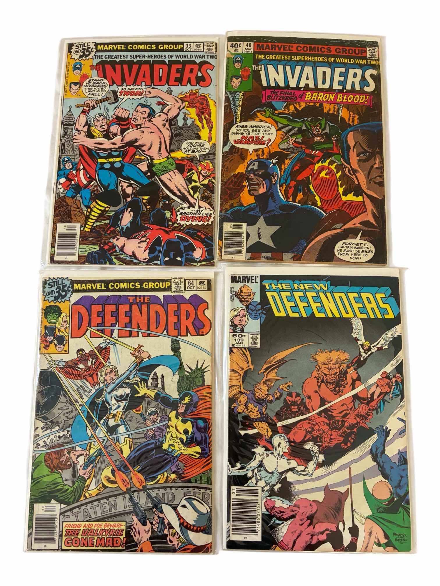 Photo 1 of MARVEL THE INVADERS & THE DEFENDERS COMIC BOOKS (4)