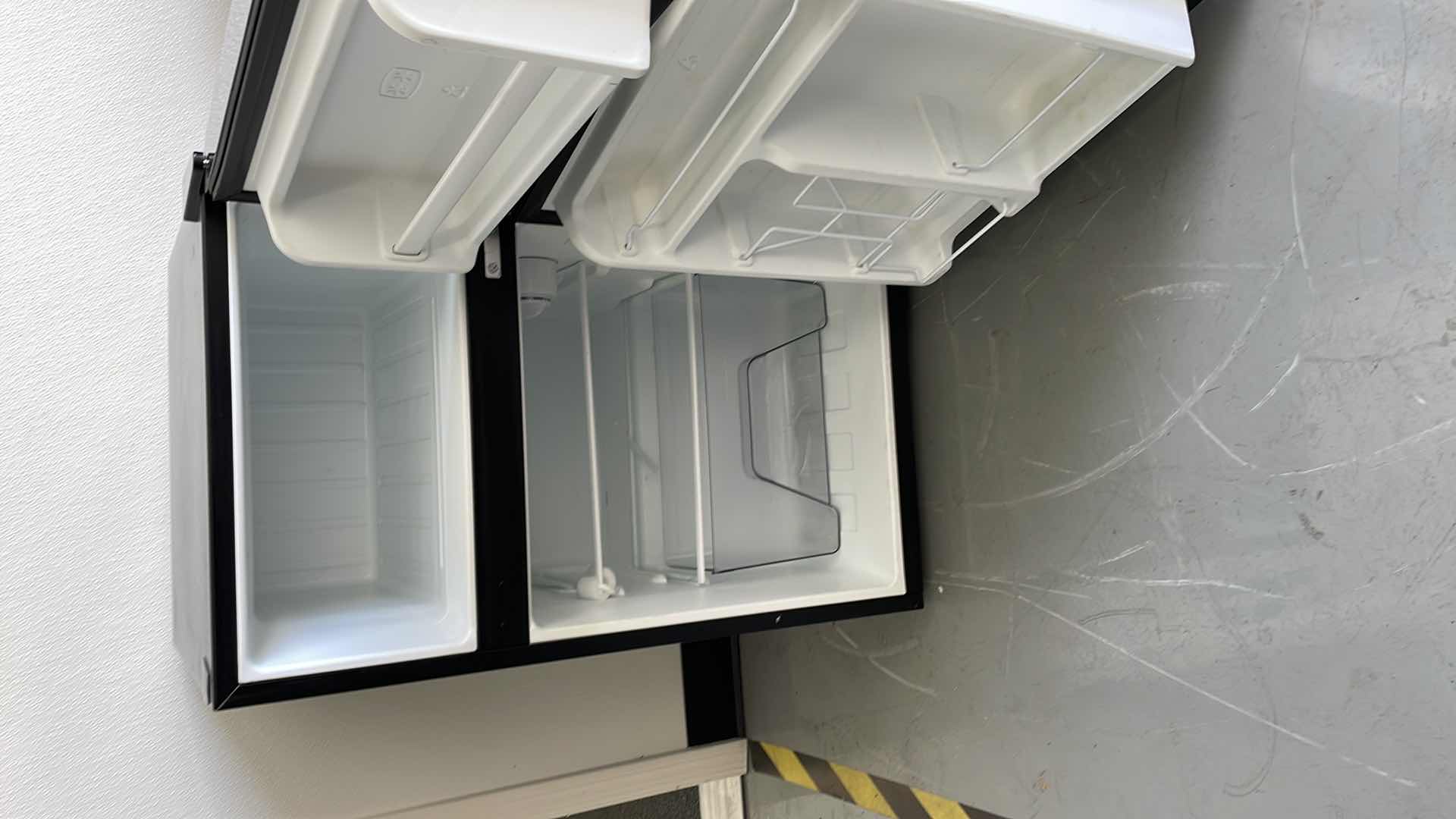 Photo 1 of WHIRLPOOL MINI FRIDGE W FREEZER 18”x 18” x H32”