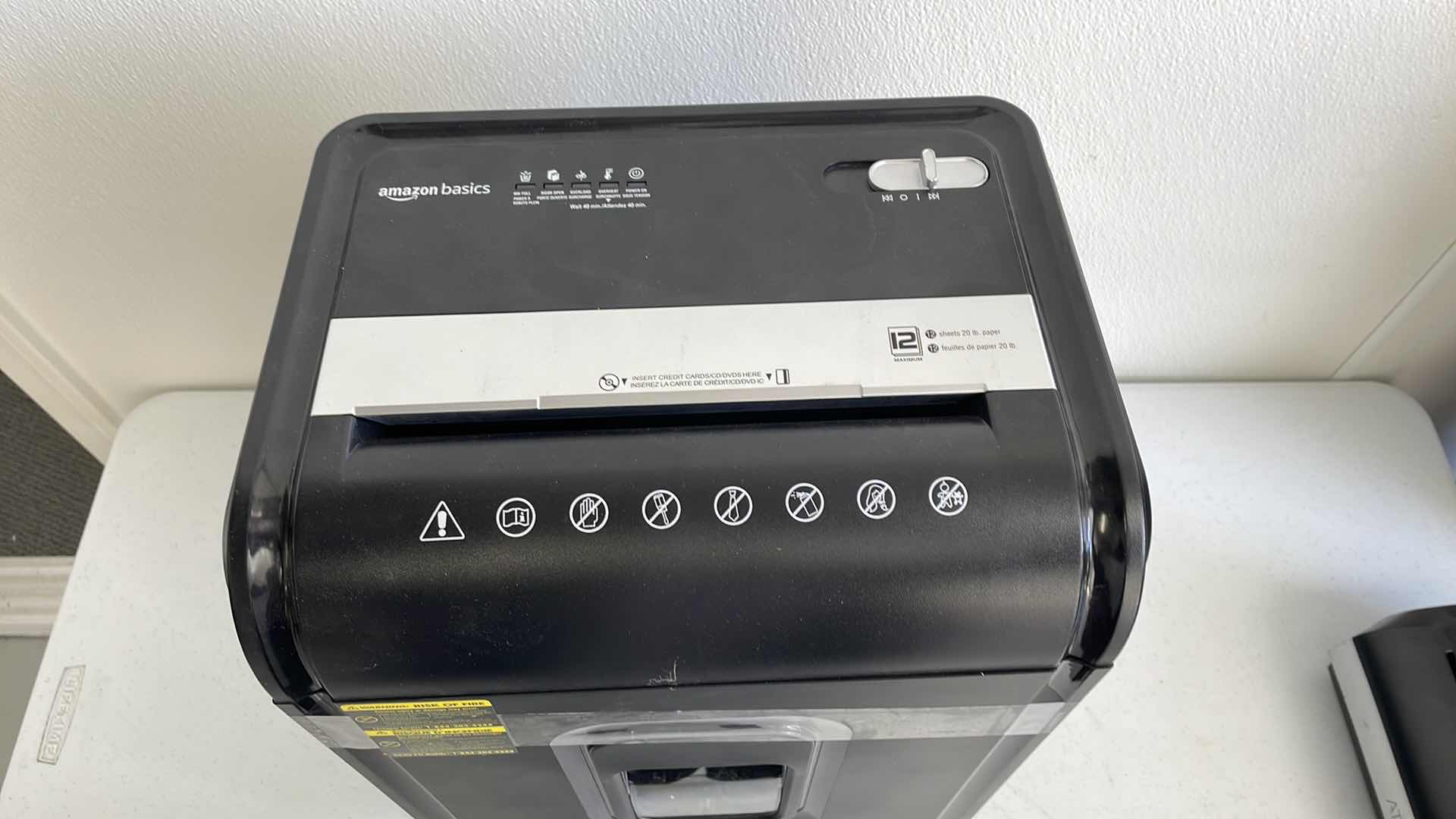 Photo 1 of AMAZON BASICS PAPER SHREDDER 13”x 10” x H21”