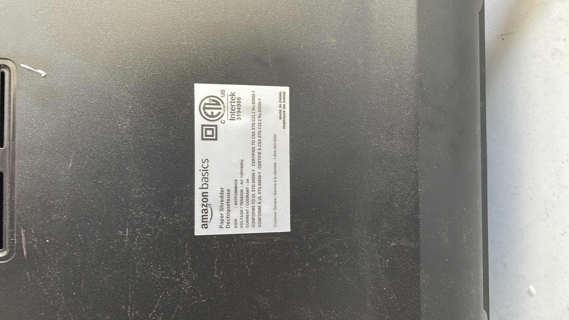 Photo 1 of AMAZON BASICS PAPER SHREDDER 13”x 10”x H21”