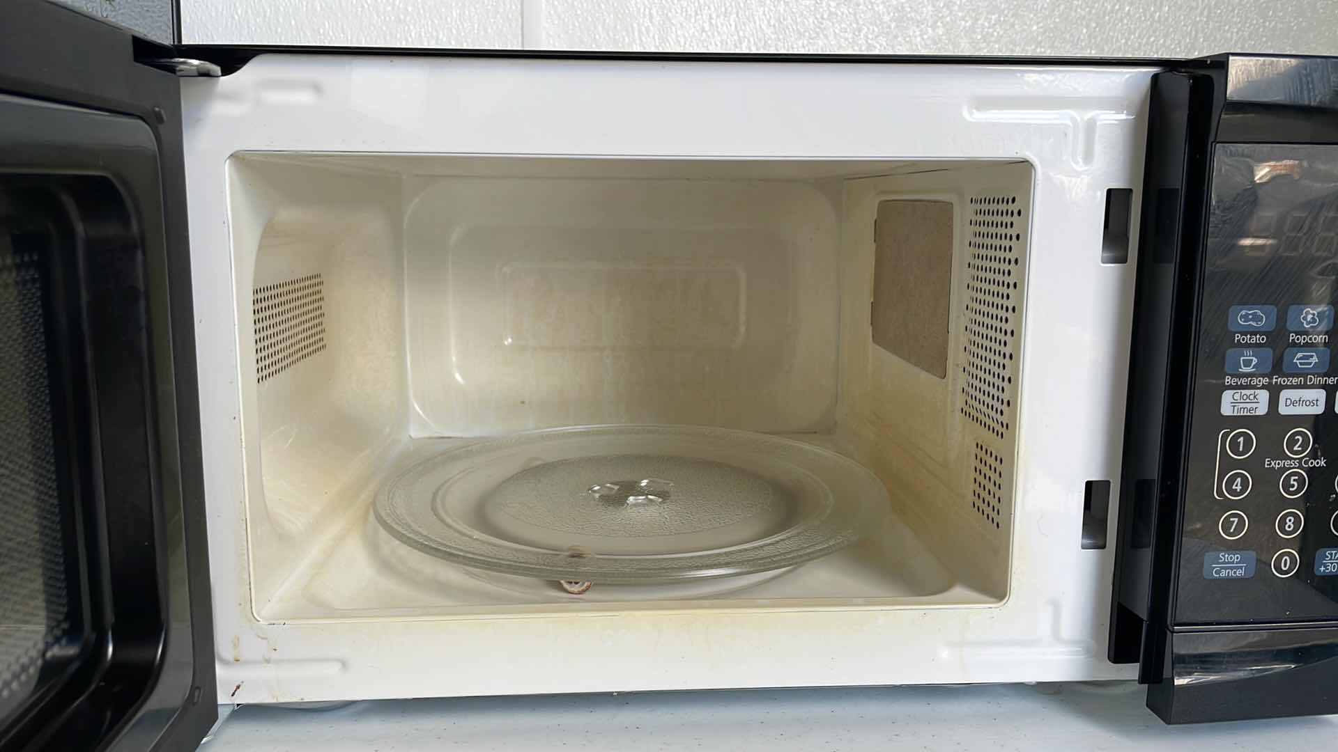 Photo 1 of MINI FRIDGE  18”x 17” x H18” & MICROWAVE OVEN 
17”x 12”x H9”