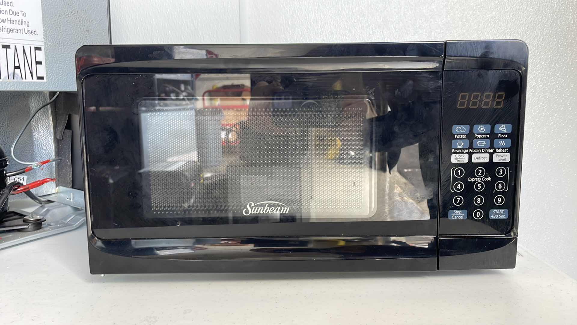 Photo 1 of MINI FRIDGE  18”x 17” x H18” & MICROWAVE OVEN 
17”x 12”x H9”