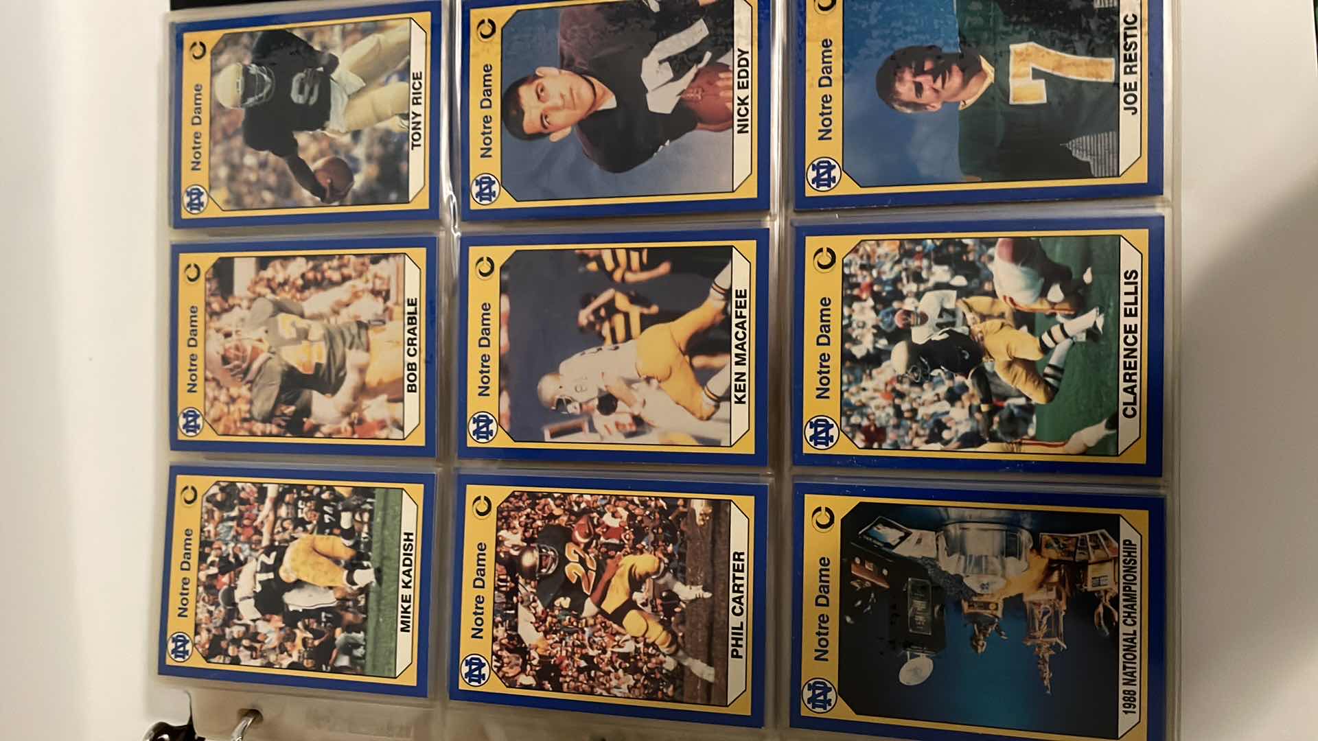 Photo 1 of 1990 NOTRE DAME COLLEGIATE COLLECTIONS CARDS W BINDER INCLUDES JOE MONTANA