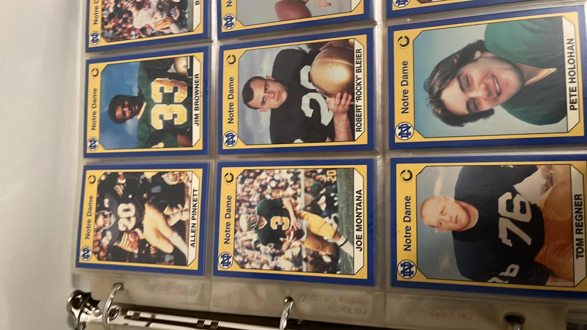 Photo 1 of 1990 NOTRE DAME COLLEGIATE COLLECTIONS CARDS W BINDER INCLUDES JOE MONTANA