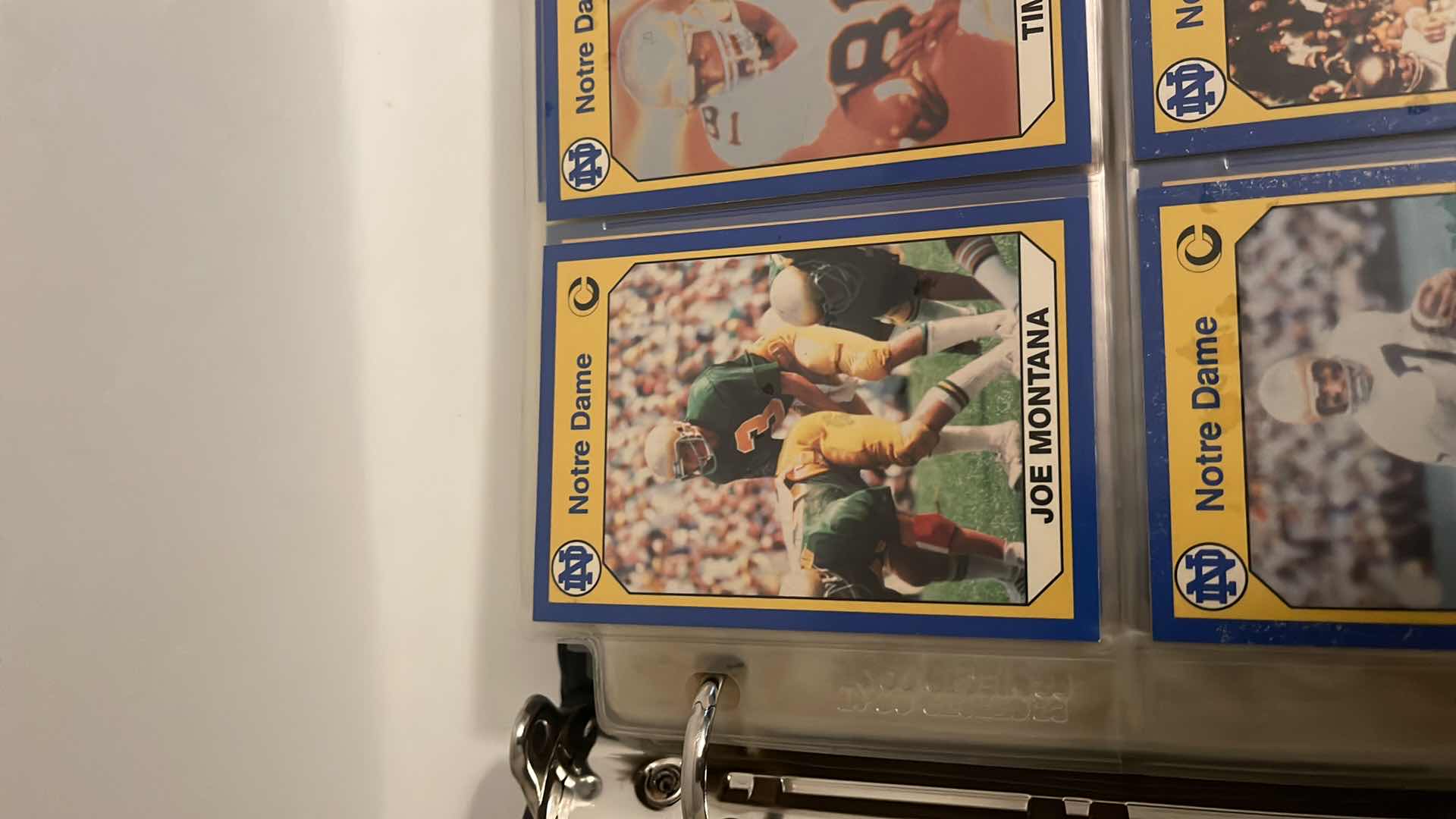 Photo 1 of 1990 NOTRE DAME COLLEGIATE COLLECTIONS CARDS W BINDER INCLUDES JOE MONTANA