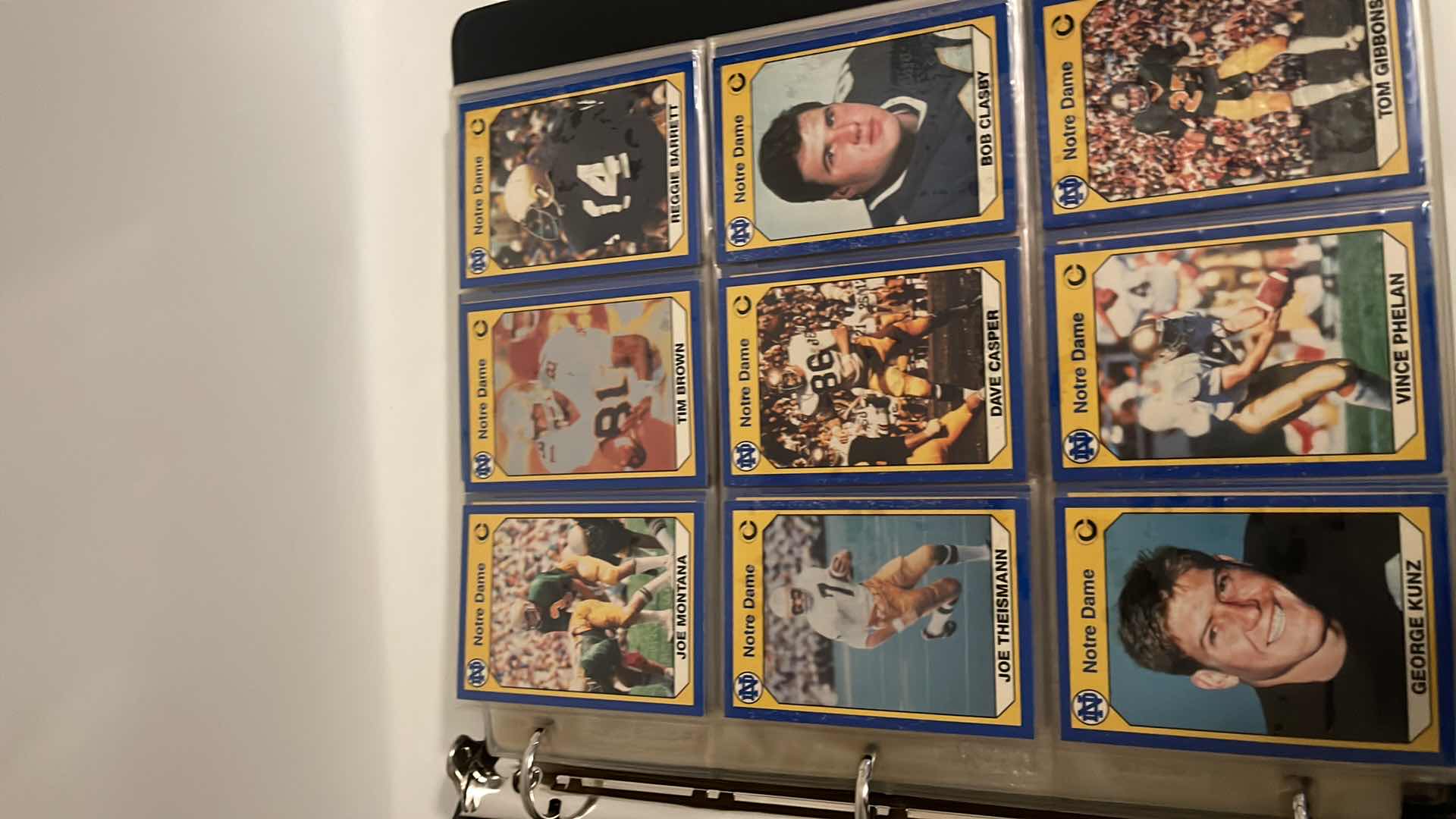 Photo 1 of 1990 NOTRE DAME COLLEGIATE COLLECTIONS CARDS W BINDER INCLUDES JOE MONTANA