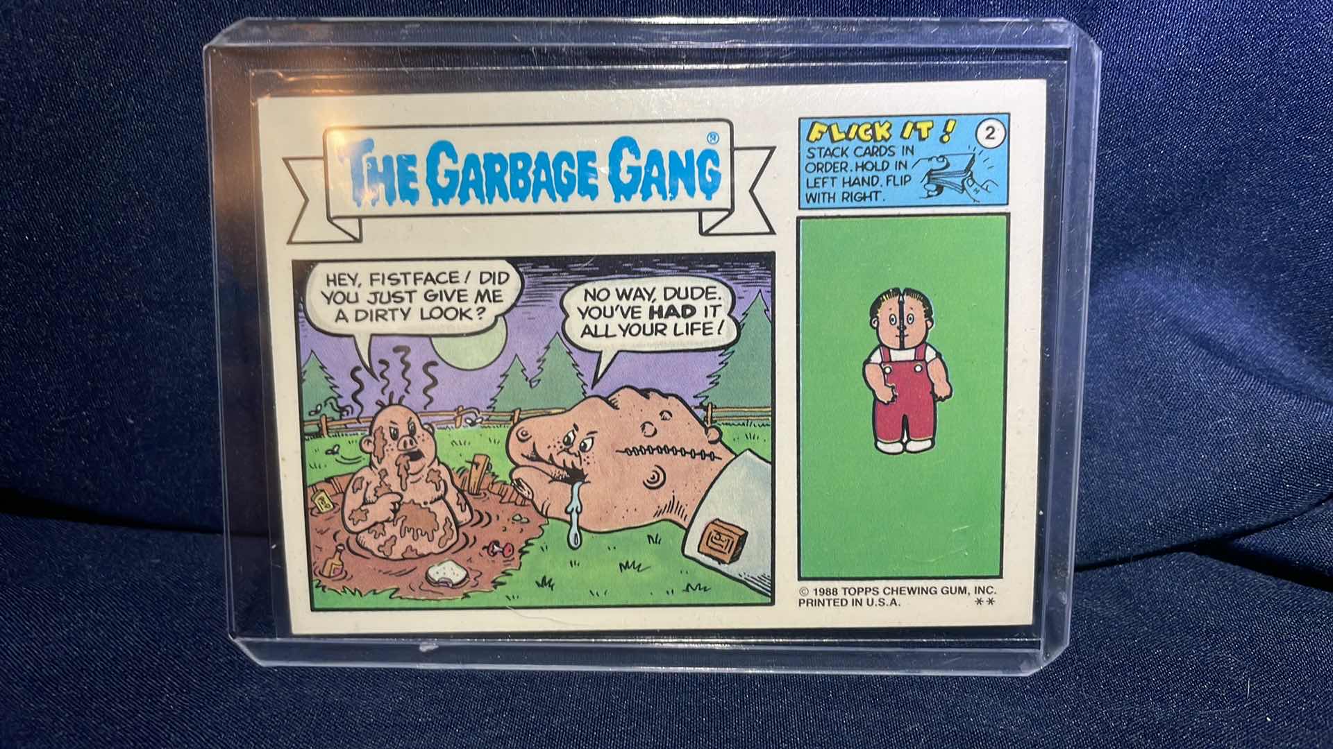 Photo 1 of 1988 TOPPS GARBAGE PAIL KIDS CHISELER CHAD CARD # 486a