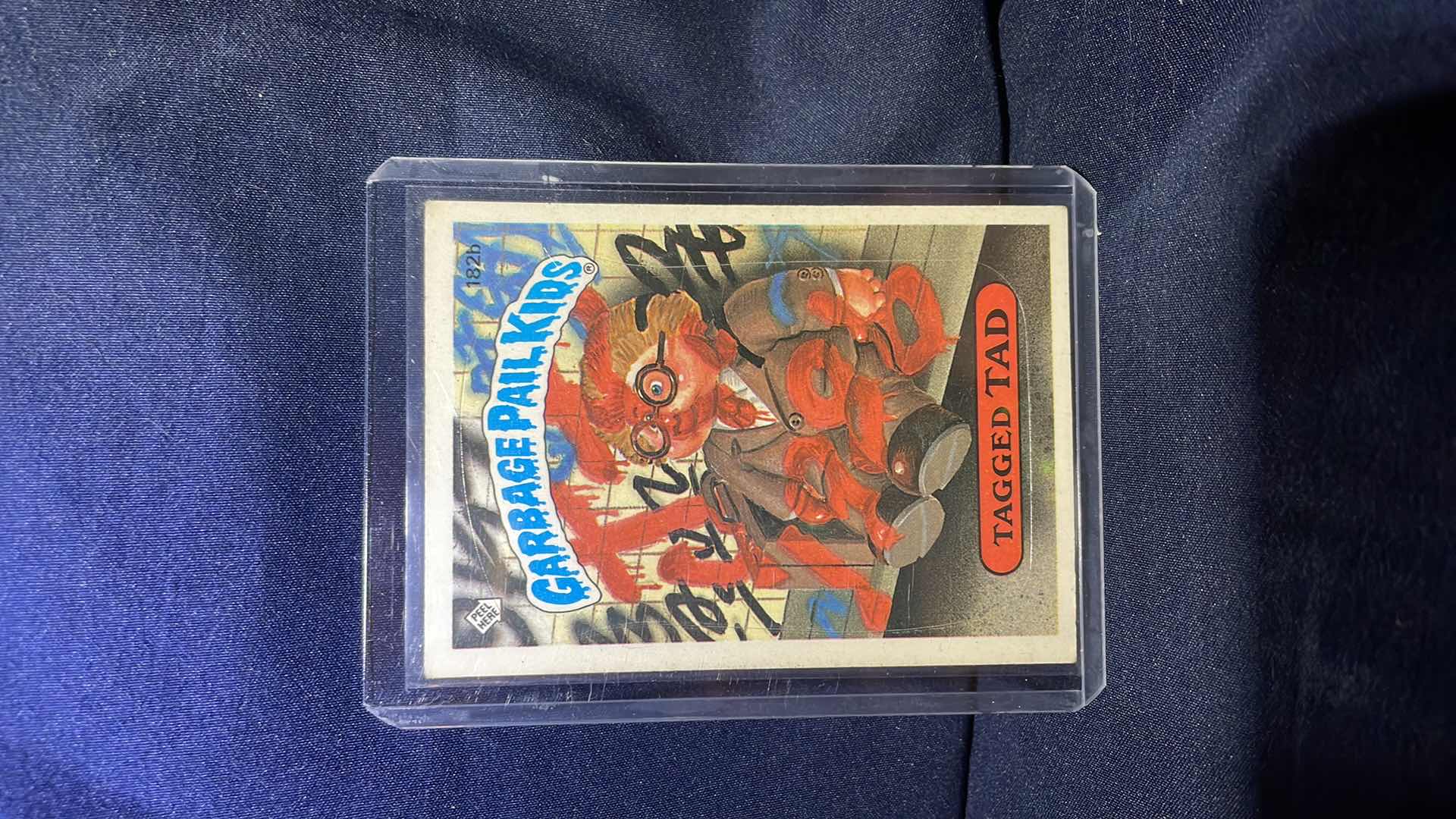 Photo 1 of 1986 TOPPS GARBAGE PAIL KIDS TAGGED TAD CARD