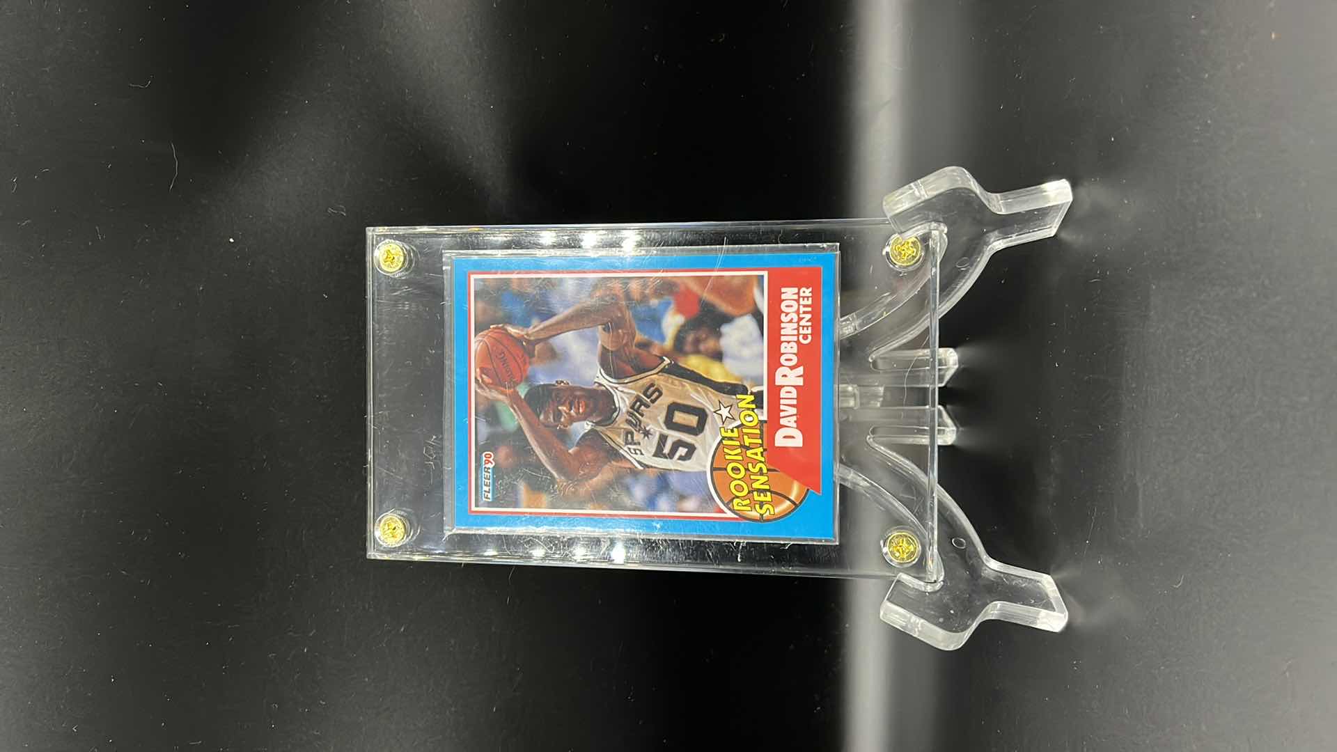 Photo 1 of 1990 DAVID ROBINSON FLEER ROOKIE SENSATION CARD 1