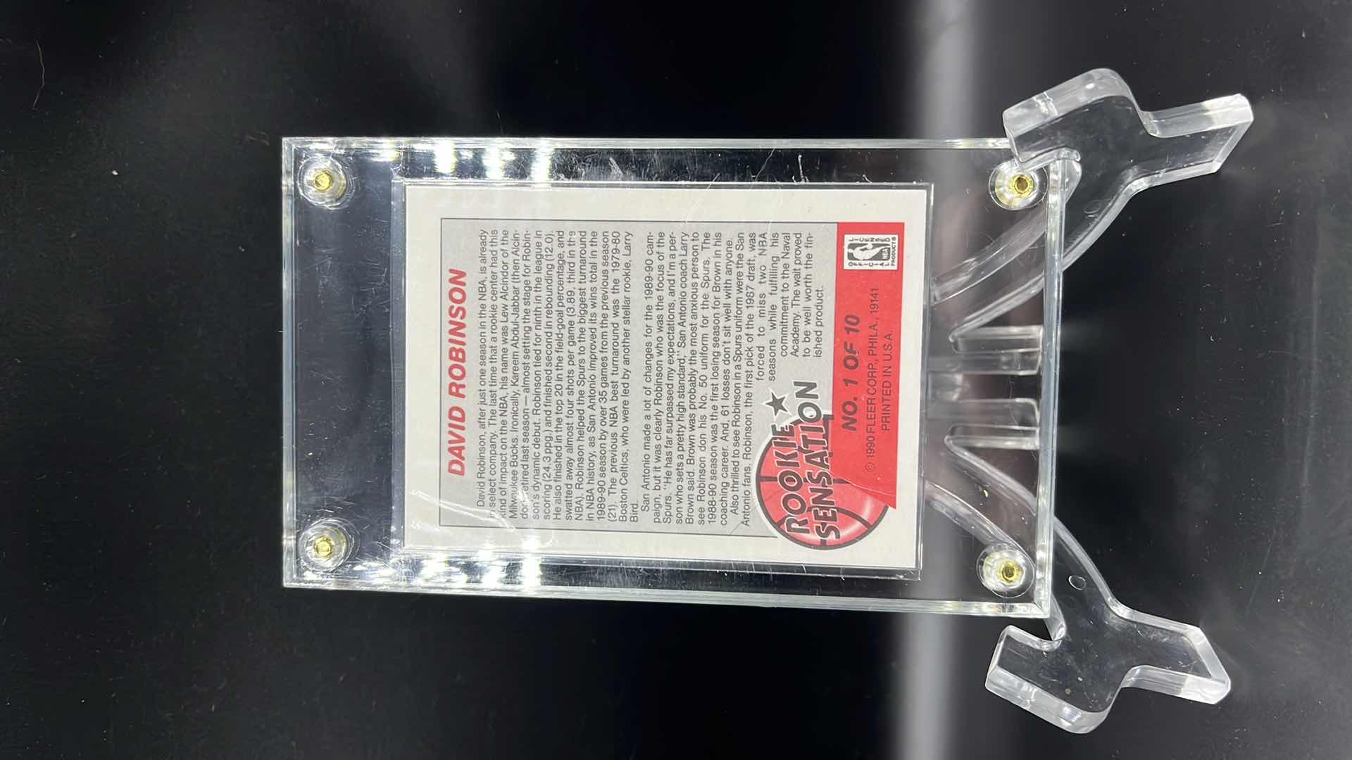 Photo 1 of 1990 DAVID ROBINSON FLEER ROOKIE SENSATION CARD 1