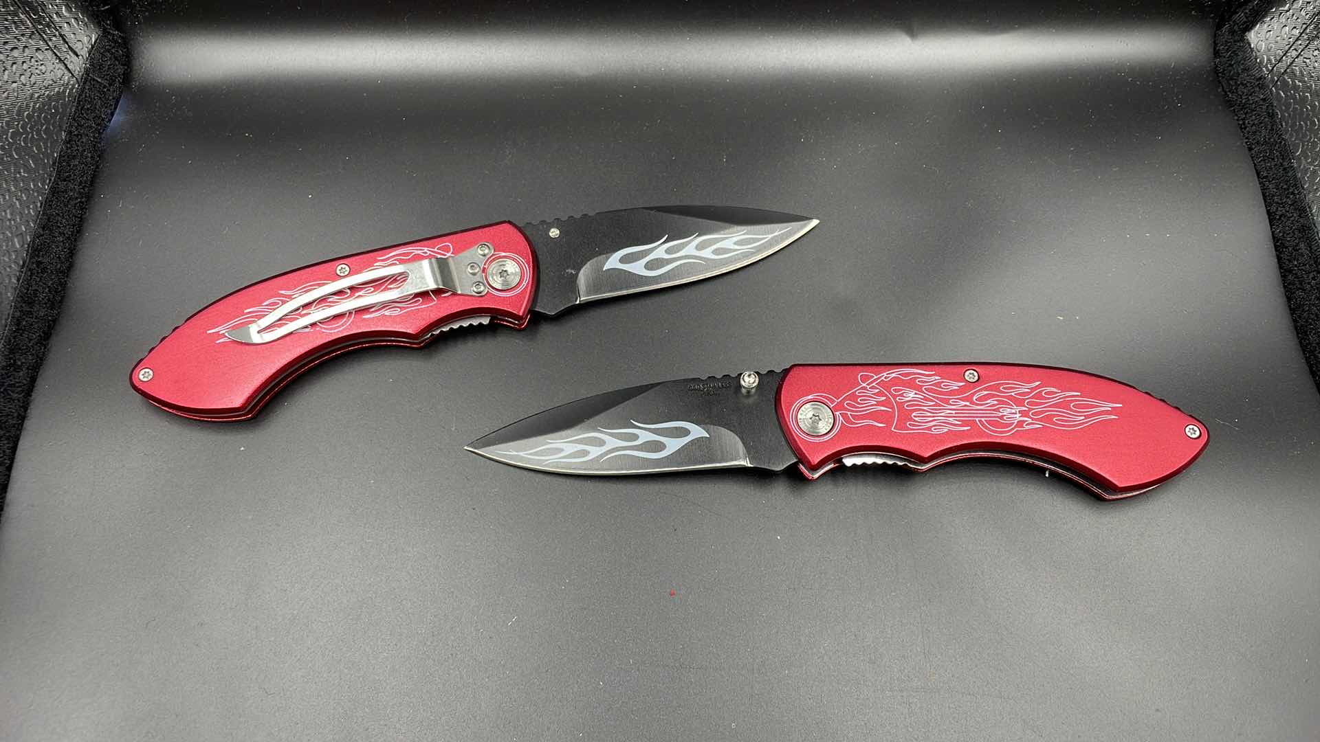 Photo 1 of SET OF TWO RED CHOPPER FOLDING KNIVES 8”