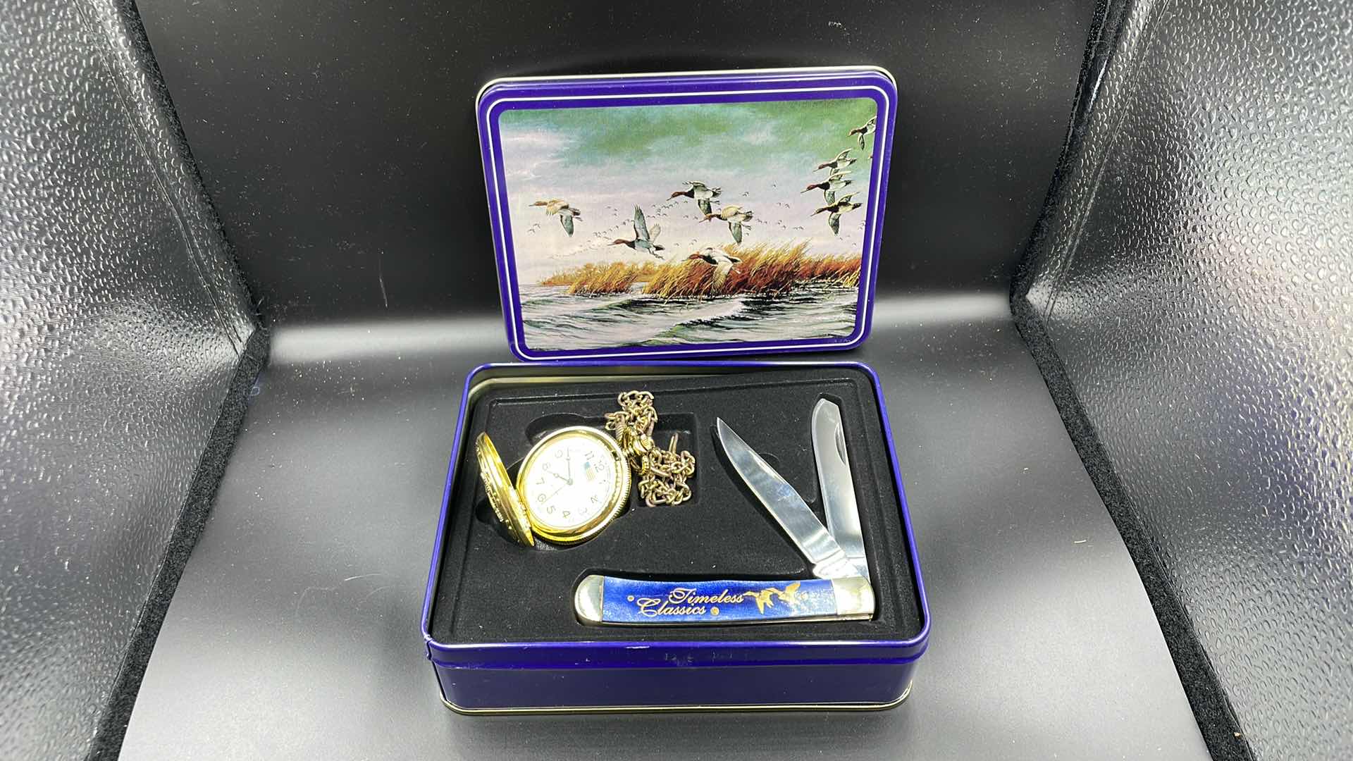 Photo 1 of DECORATIVE DUCK TIN POCKET WATCH AND POCKET KNIFE 6”