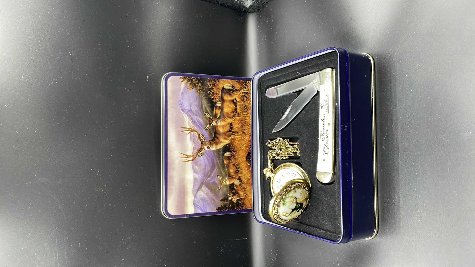 Photo 1 of DECORATIVE DEER TIN WITH POCKET WATCH AND POCKET KNIFE