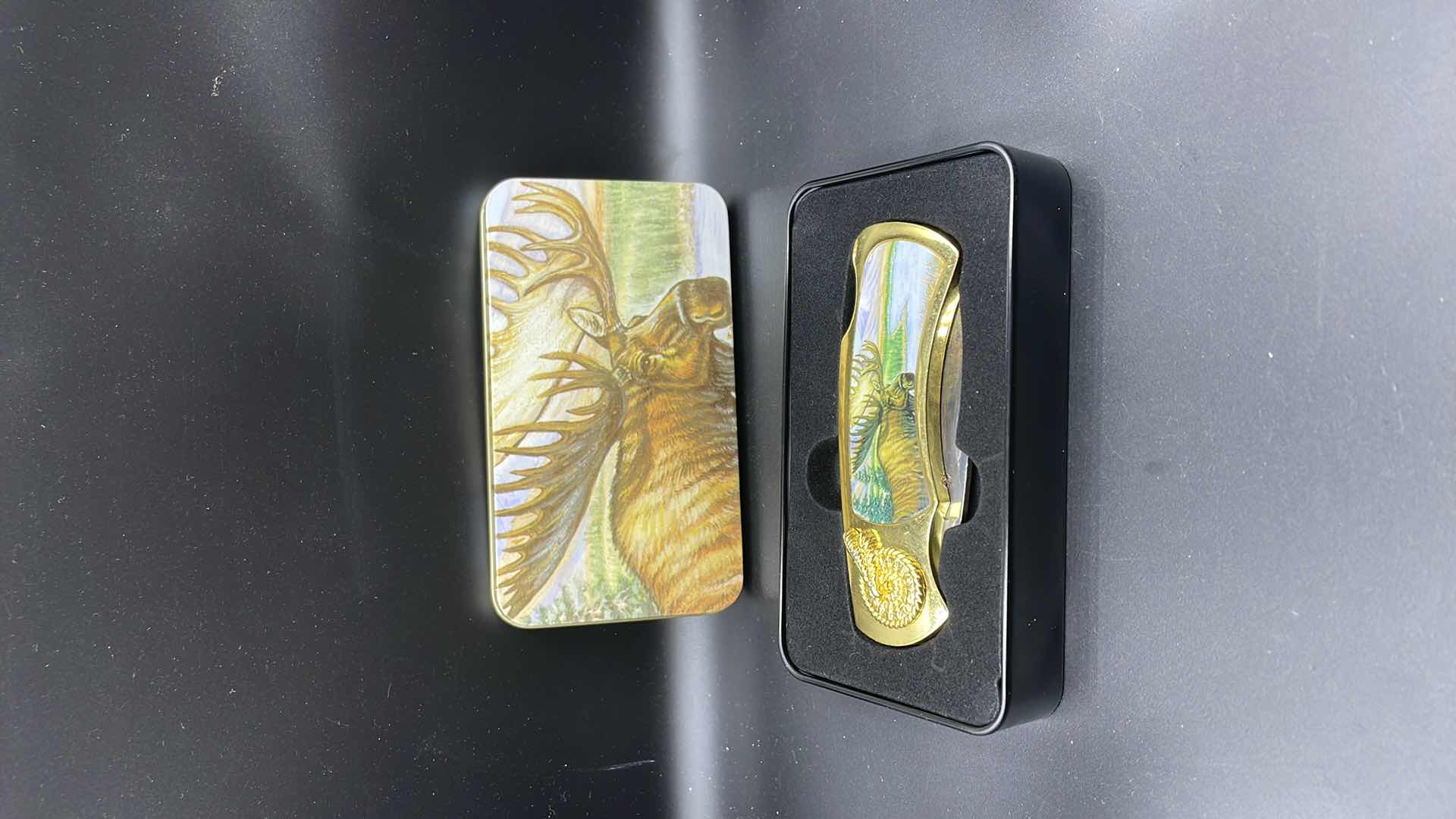 Photo 1 of MOOSE POCKET KNIFE WITH DECORATIVE TIN 6”