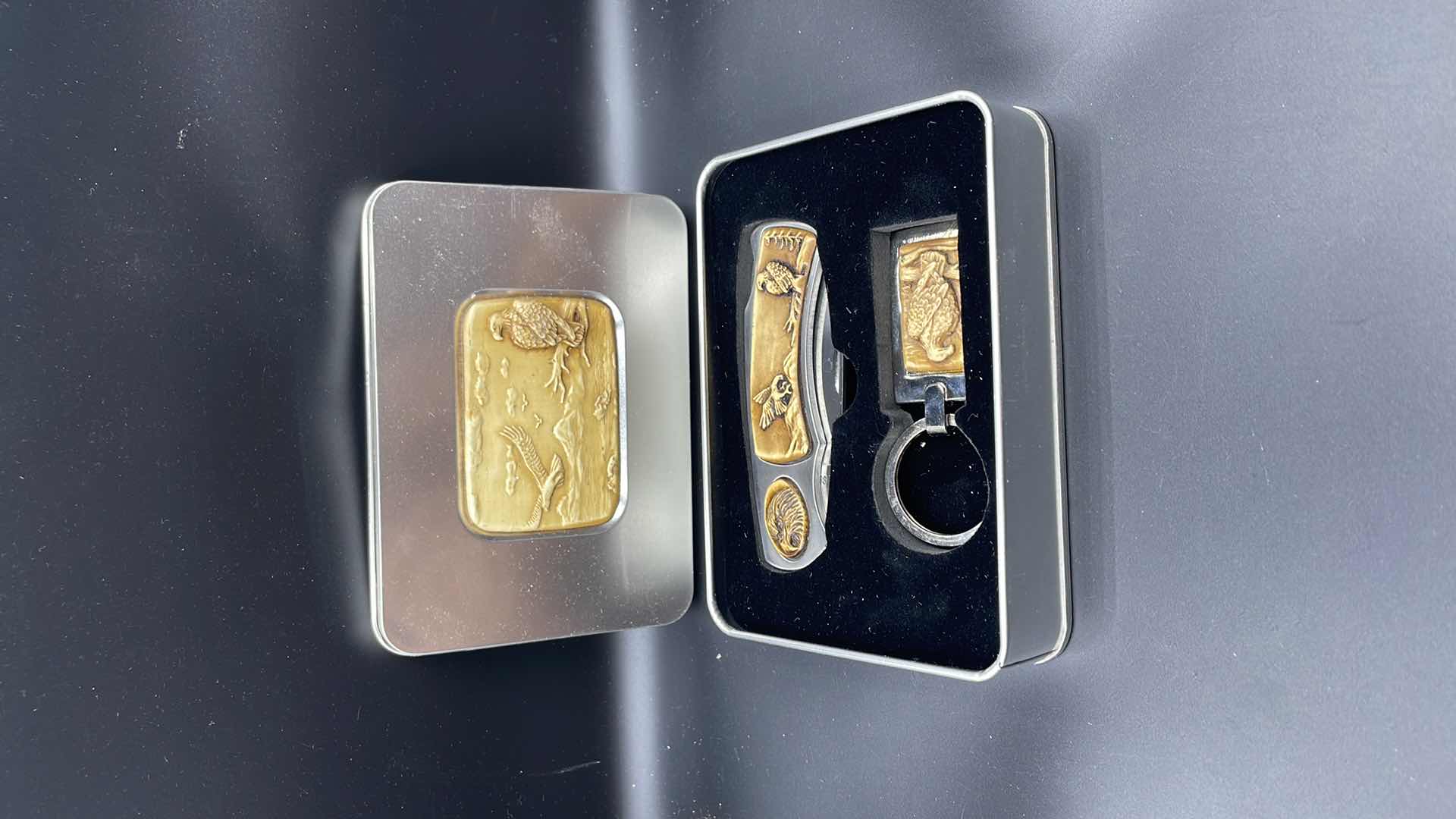 Photo 1 of DECORATIVE EAGLE TIN WITH POCKET KNIFE AND KEYCHAIN